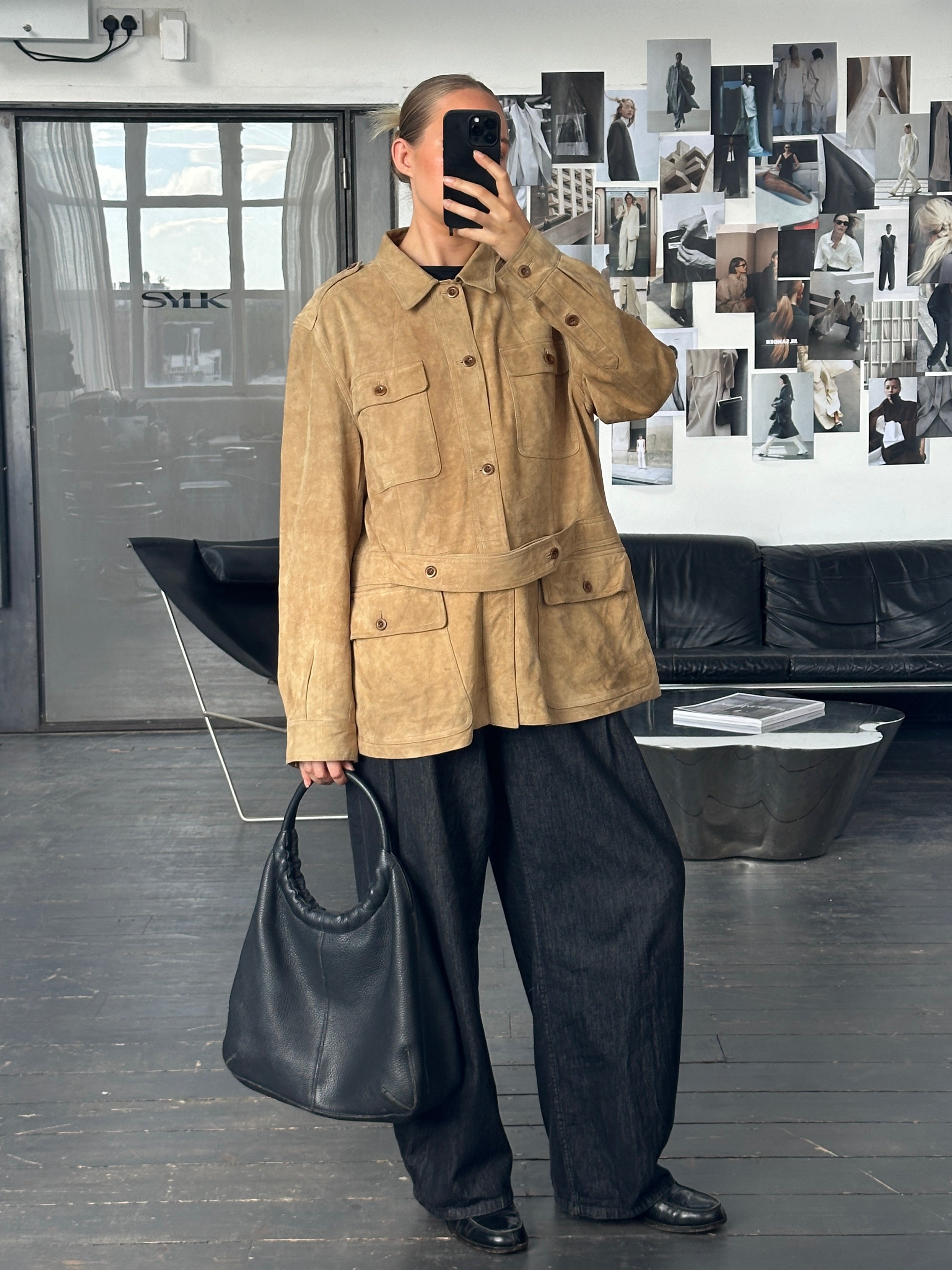 Ralph Lauren Polo 2000s Safari suede jacket in XL, tan color, featuring a collar and button details, displayed on a hanger.