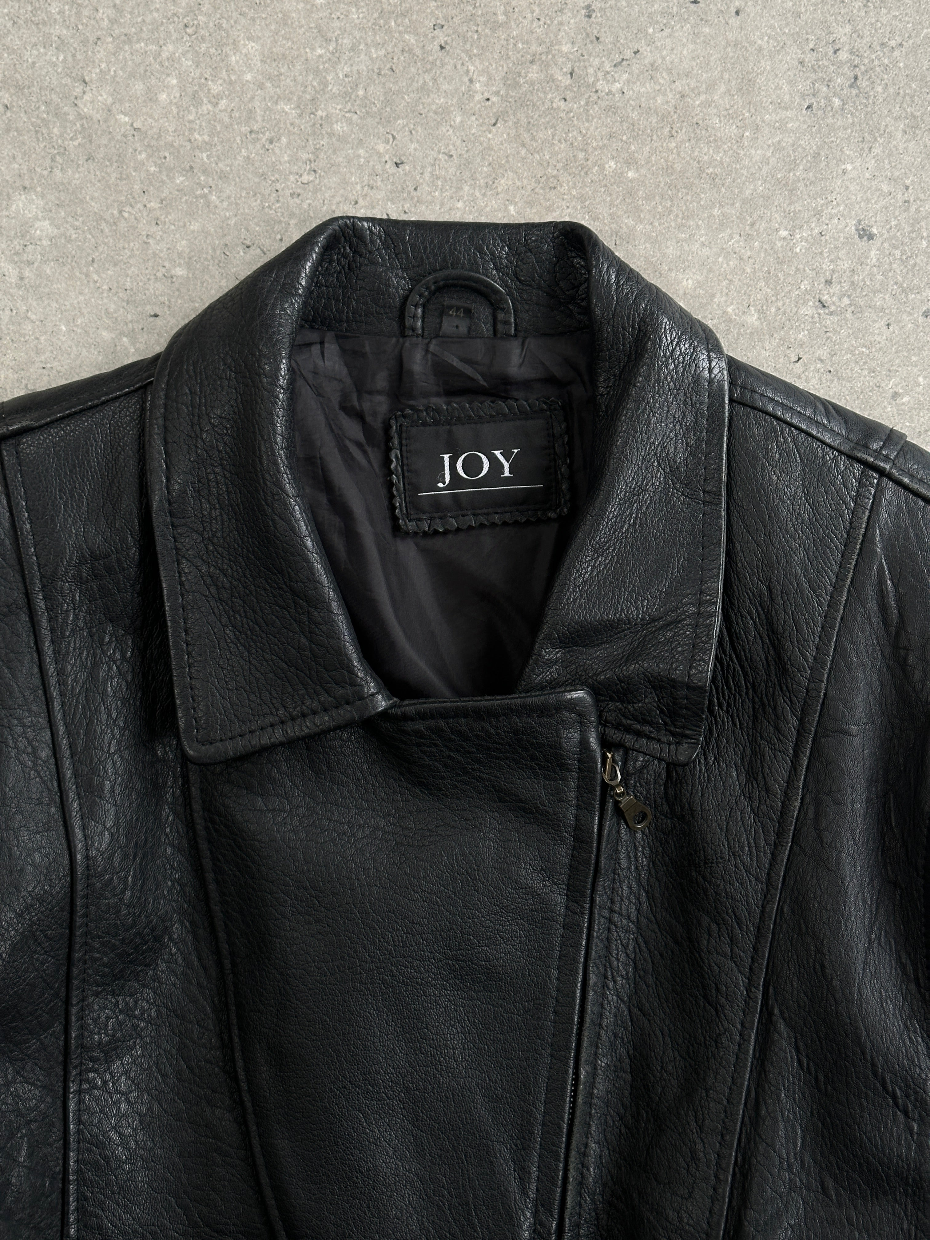 Vintage 1990s lamb leather belted jacket in XL, featuring classic style and premium leather texture.