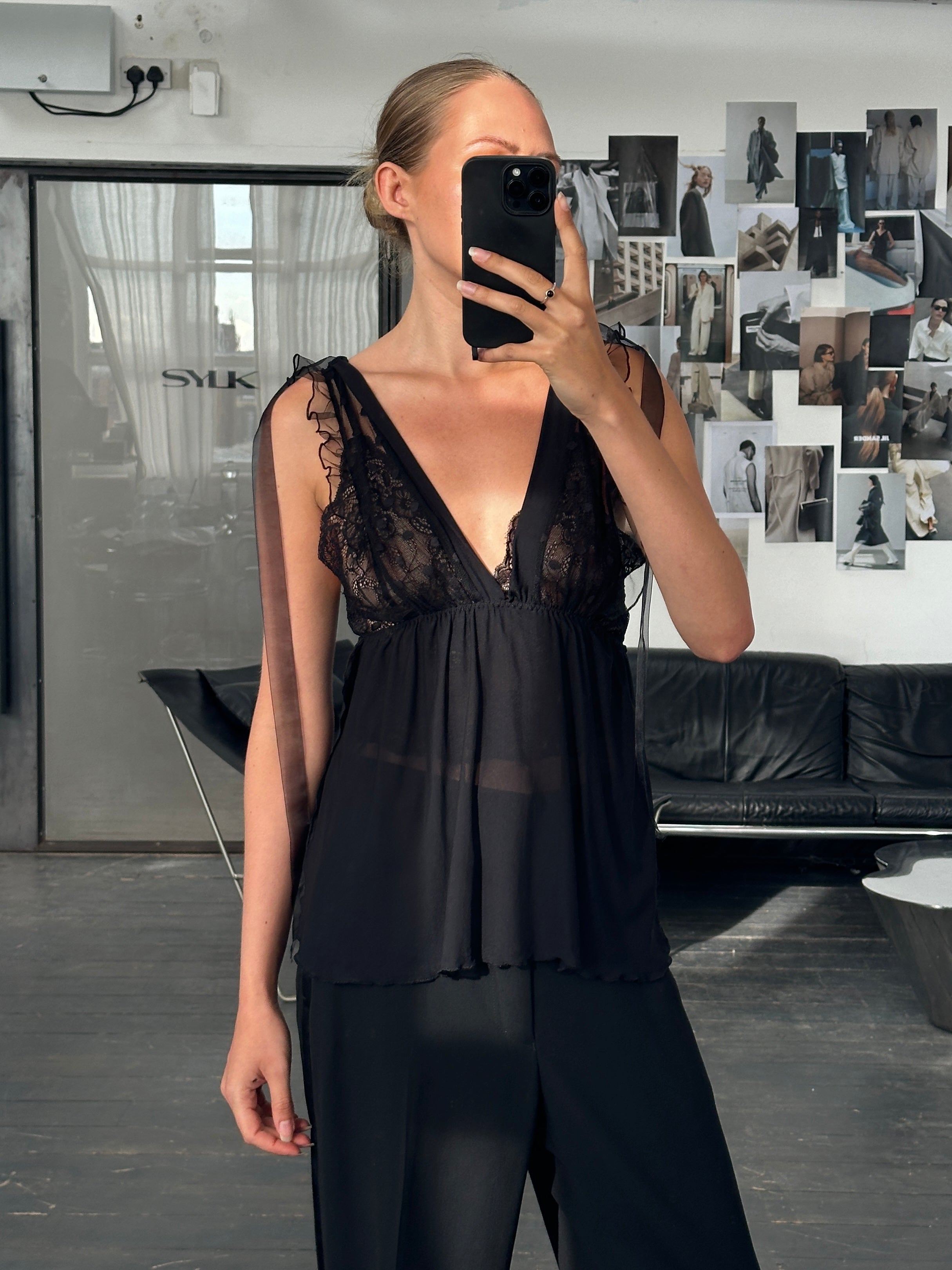 Vintage 2000s lace sheer satin babydoll top in black, featuring delicate lace details and a satin finish, size S/M.