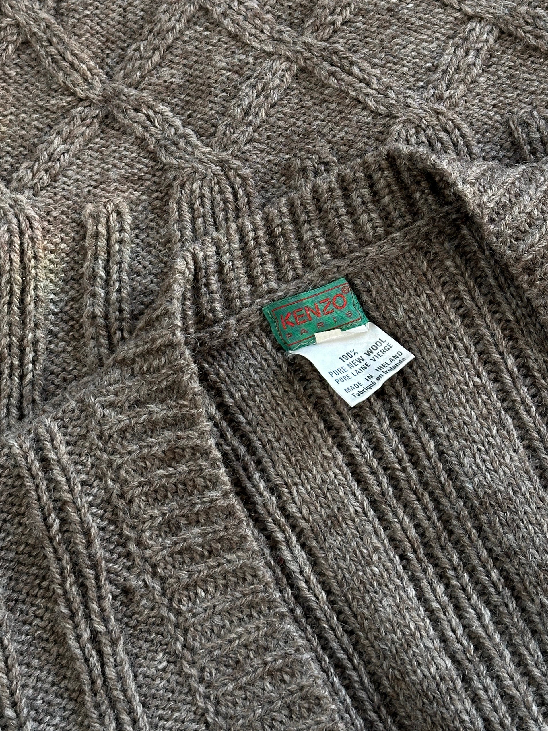 Kenzo pure wool chunky cable knit cardigan in S/M with ribbed cuffs and collar, showcasing a cozy, textured design.