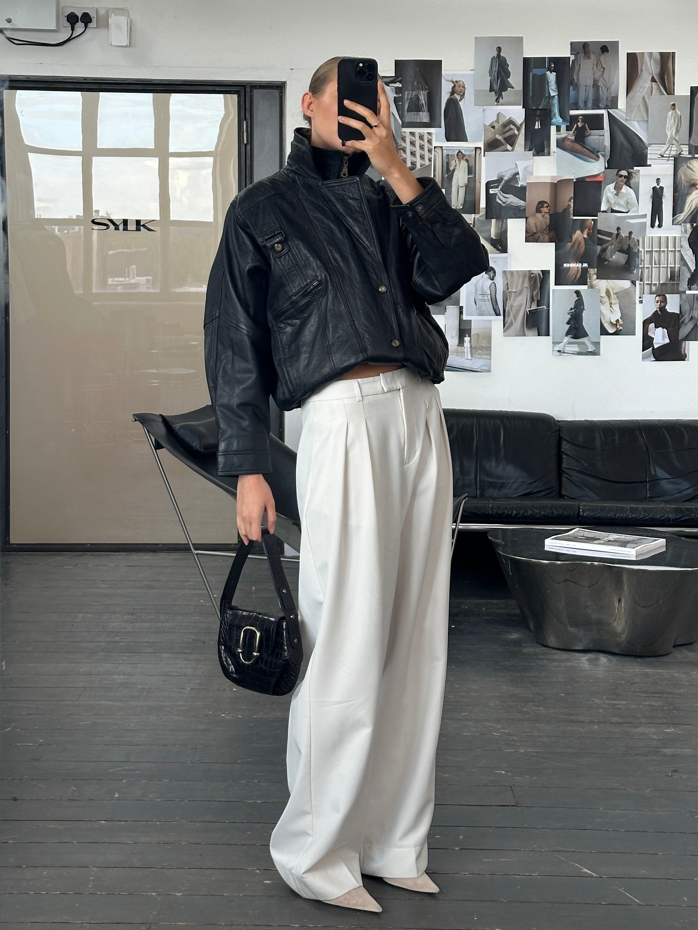 Vintage 1990s high neck leather bomber jacket in size M, featuring a classic style and durable leather material.