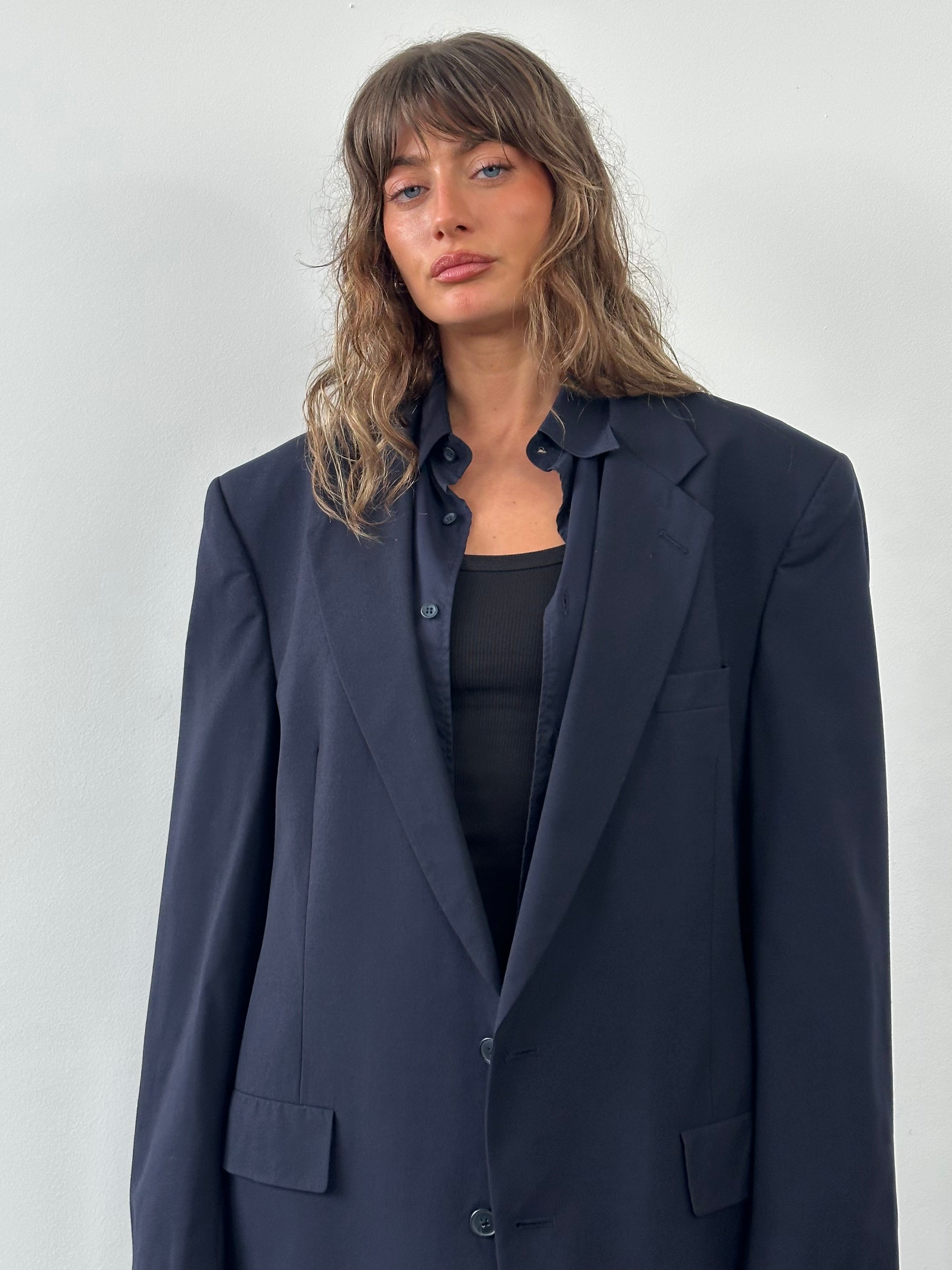 Christian Dior Monsieur 1980s pure wool single-breasted blazer in size 48L/XXL, dark navy color, tailored fit with notch lapels.