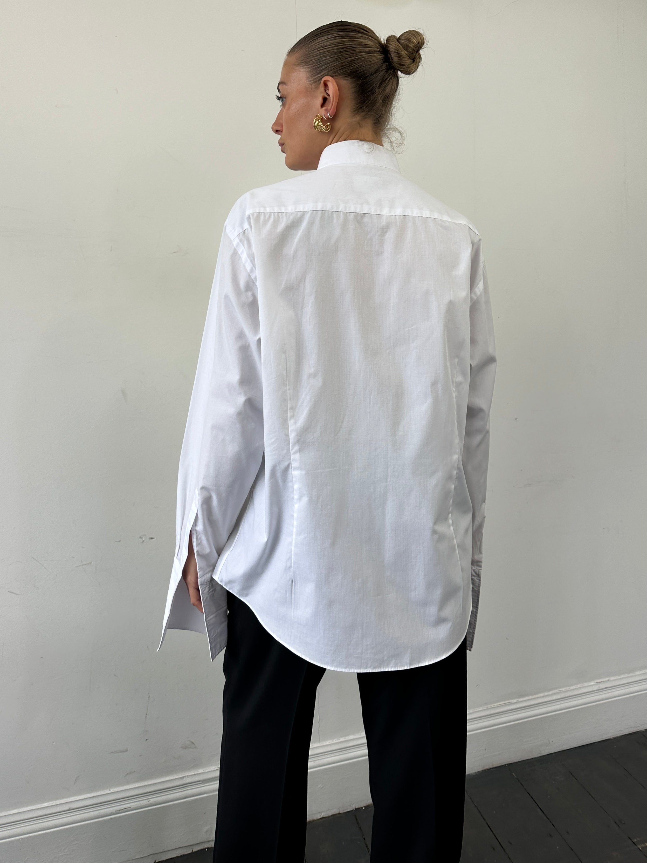 Vintage men's vintage tuxedo wing collar dress shirt in size L/XL, featuring classic style and crisp white fabric.