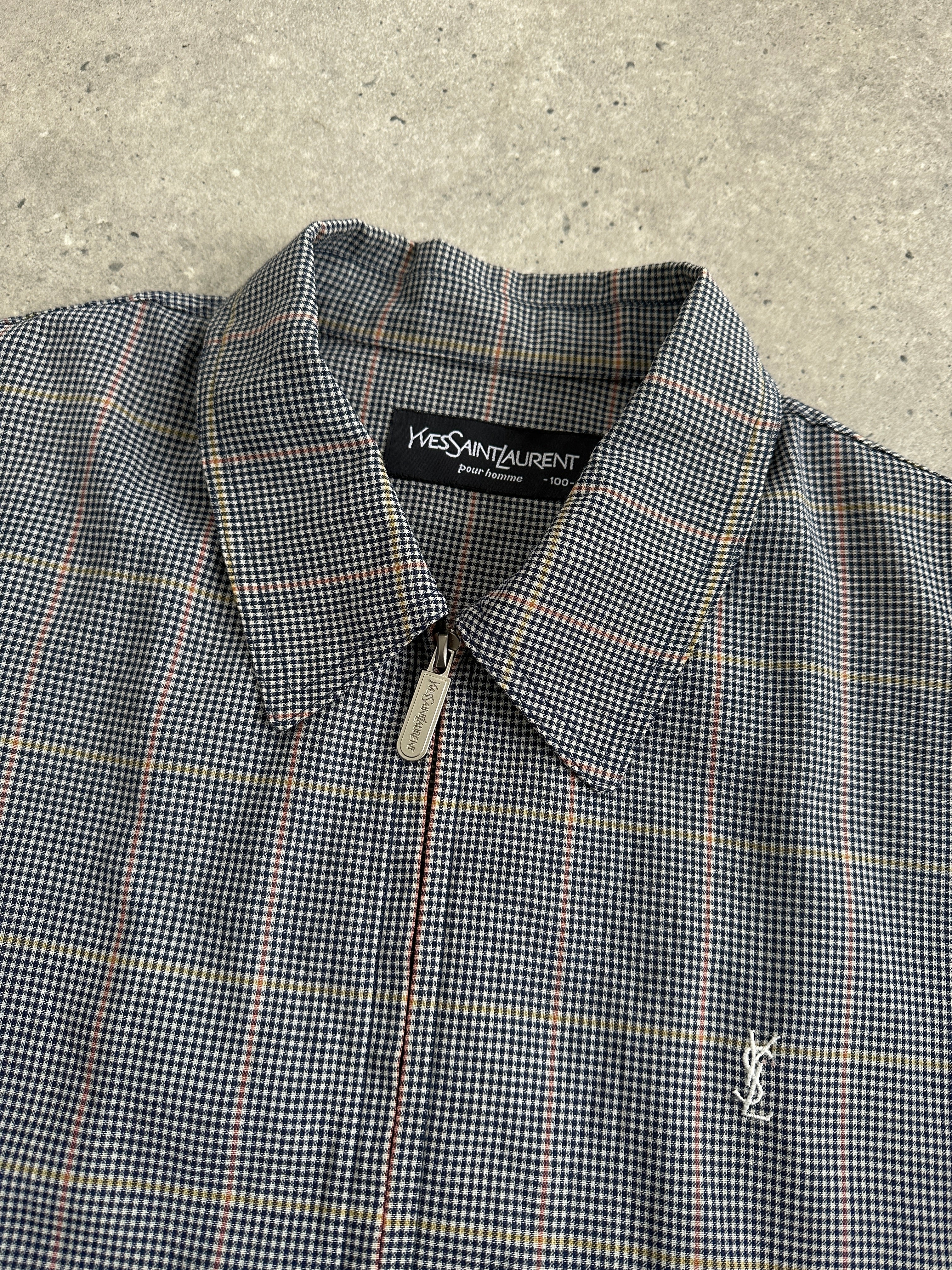 Yves Saint Laurent Pour Homme check logo bomber jacket in size L, black with signature YSL branding and check pattern details.