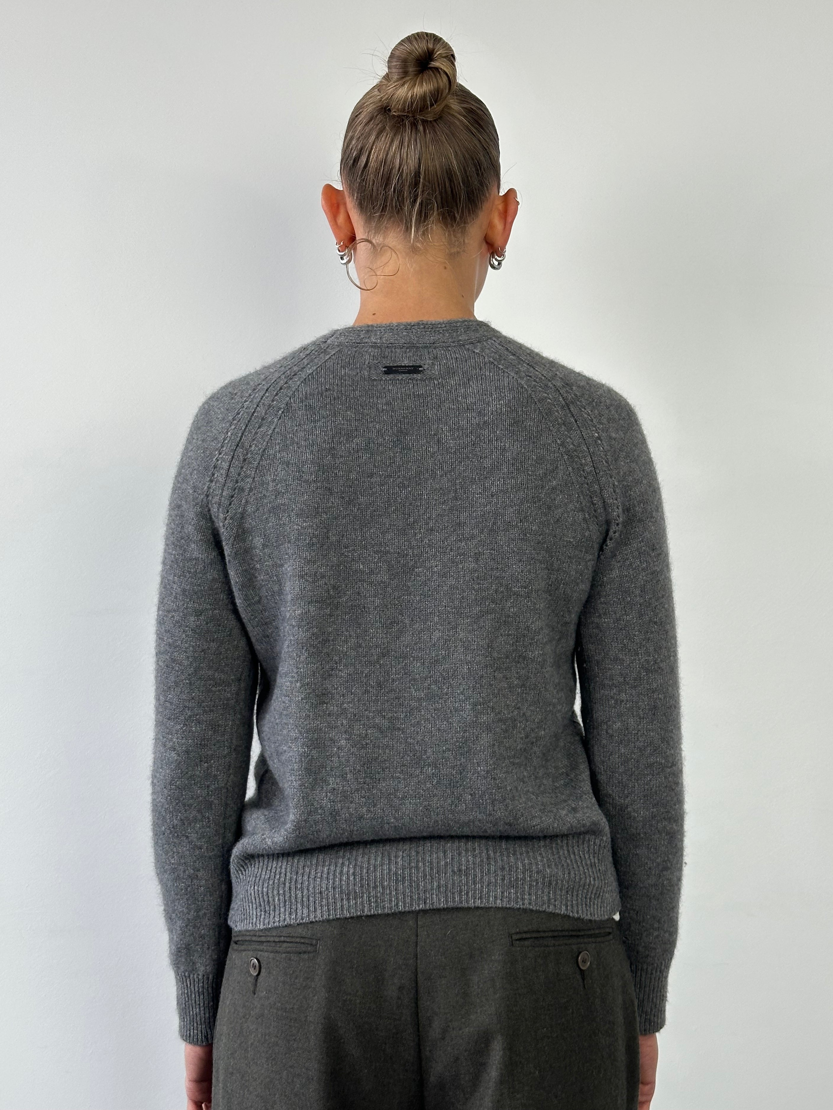 Burberry London pure cashmere knitted jumper in size S, featuring a classic design and soft texture, displayed on a neutral background.