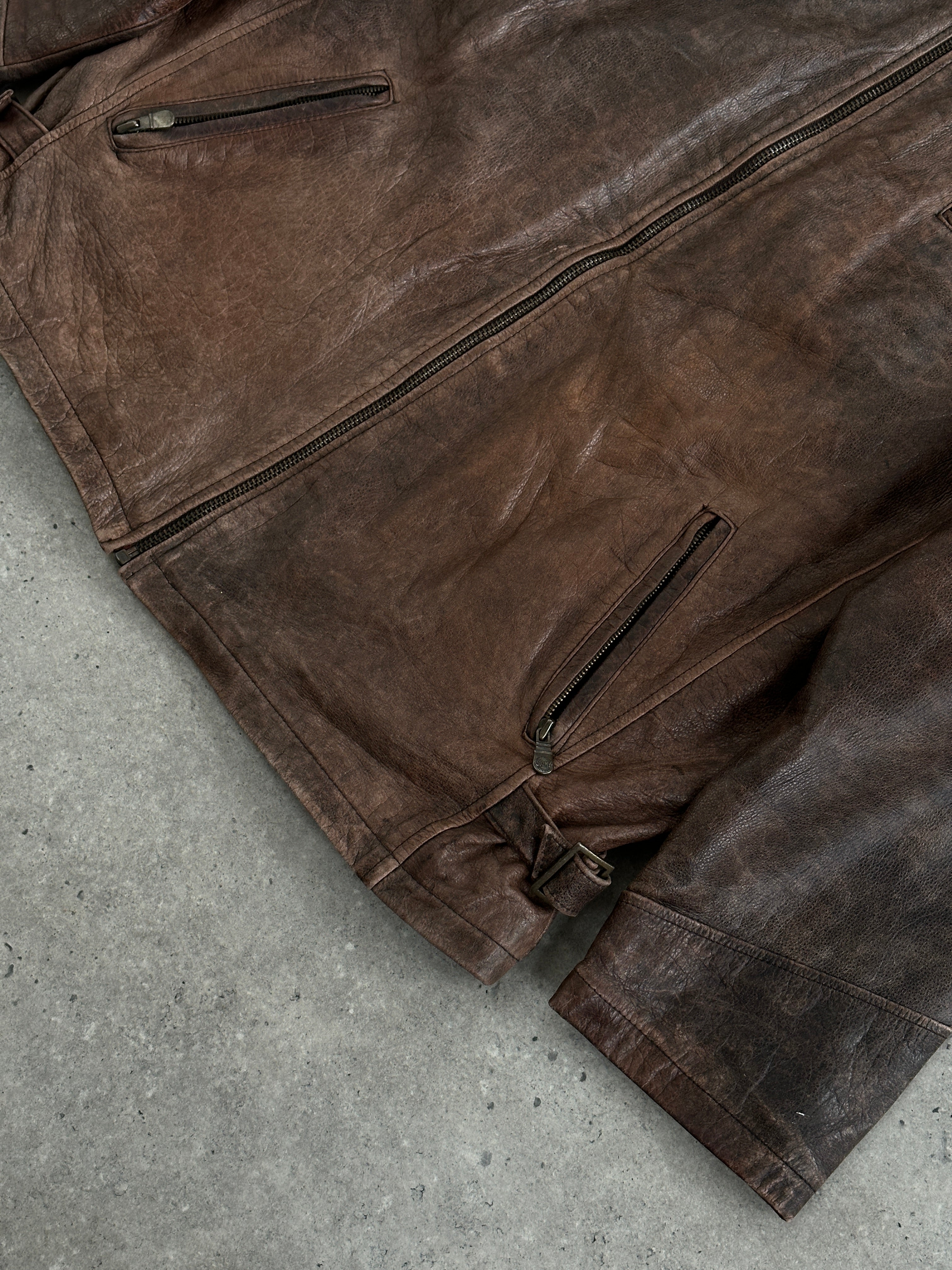 Vintage 1990s aged leather jacket in size XL, showing distressed brown leather with classic collar and button details.