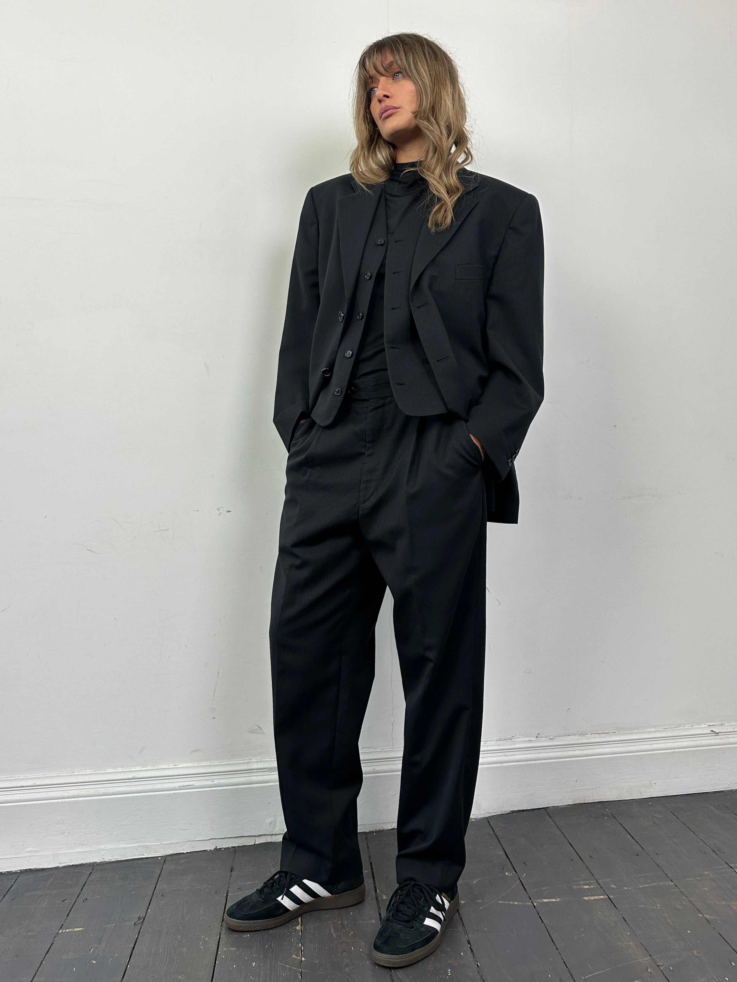 Vintage wool ribbed three-piece suit, size 40S/W32, featuring tailored jacket, vest, and trousers in classic style.