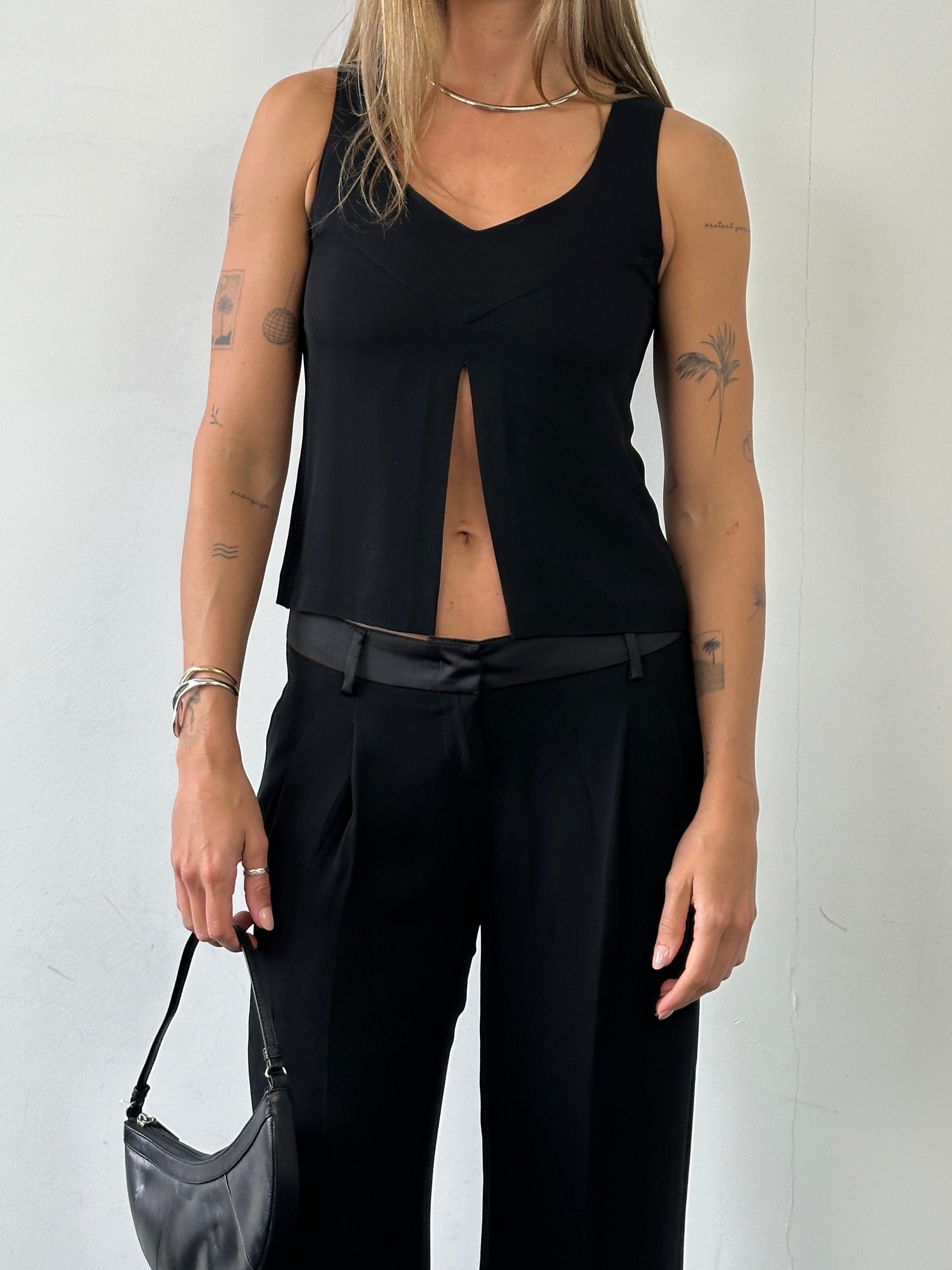 Emporio Armani split front tank top in size XS, featuring a stylish front split and sleek design, made from soft fabric.