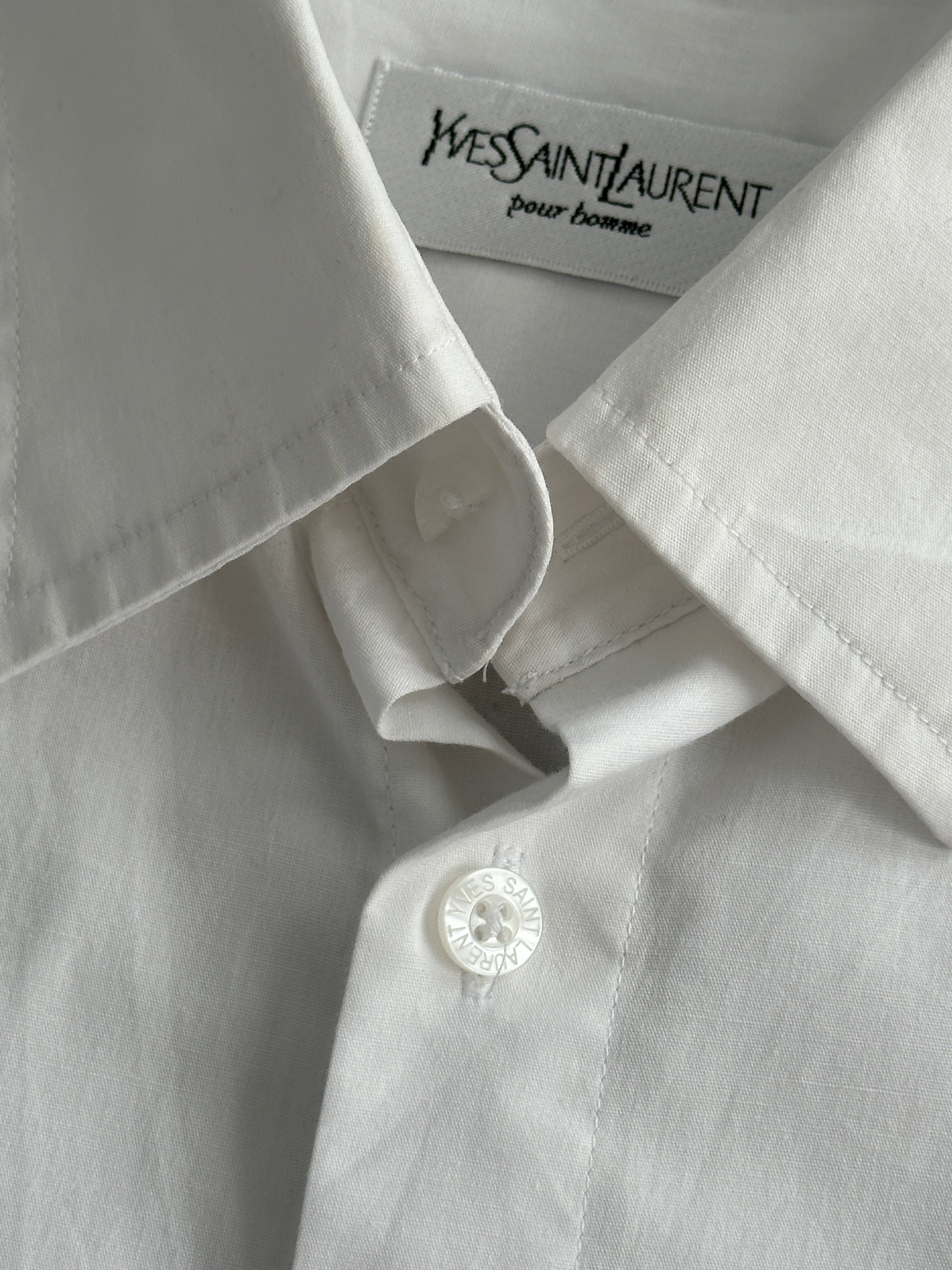Yves Saint Laurent Pour Homme cotton short sleeve logo shirt in size L, featuring the brand's signature design and logo on the front.