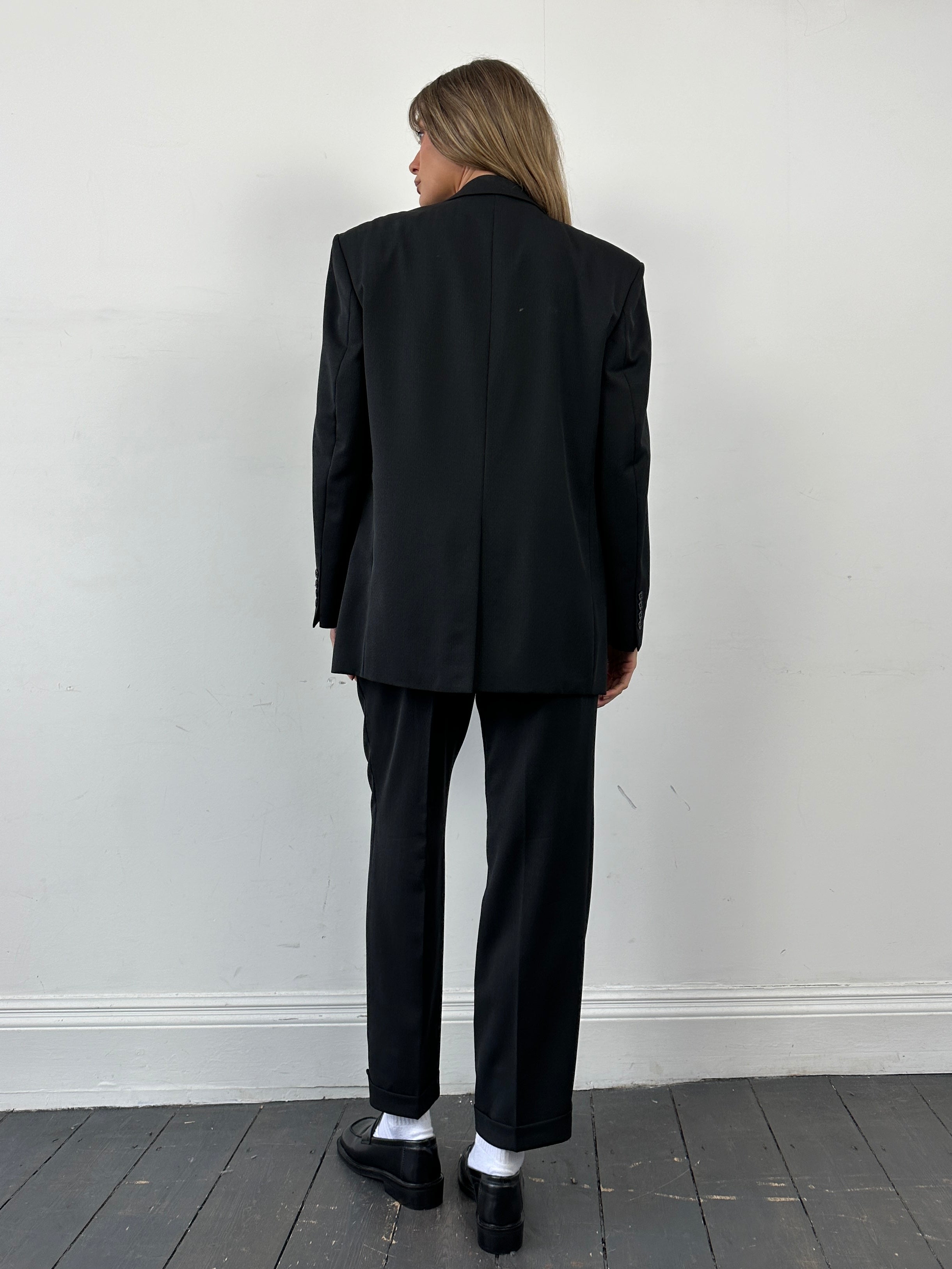 Pierre Cardin wool single-breasted suit jumpsuit in size 40S/W30, tailored fit with classic lapel and front button closure.