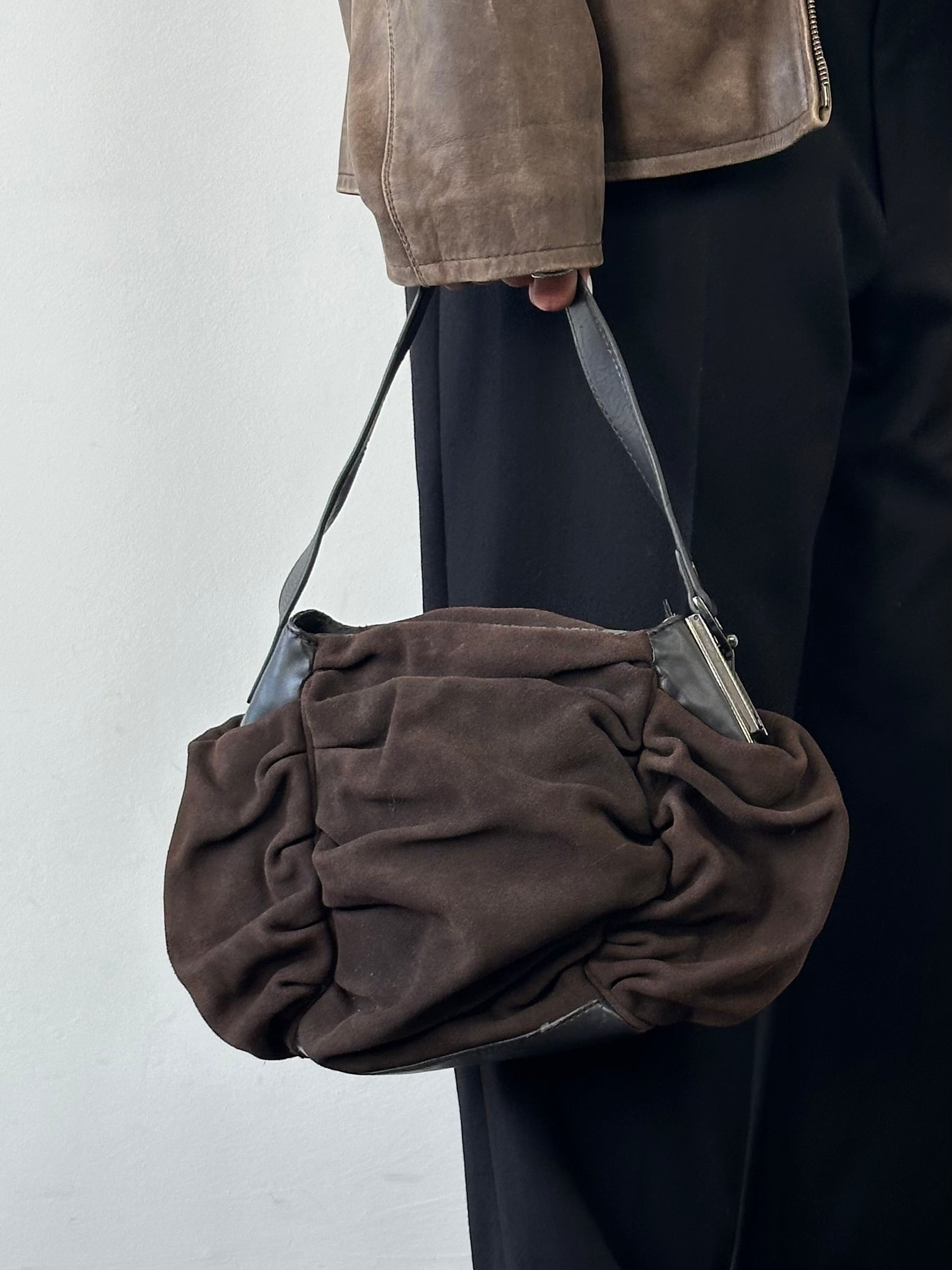 Armani Jeans suede ruched shoulder bag with a stylish design, featuring a soft texture and ruched detailing.
