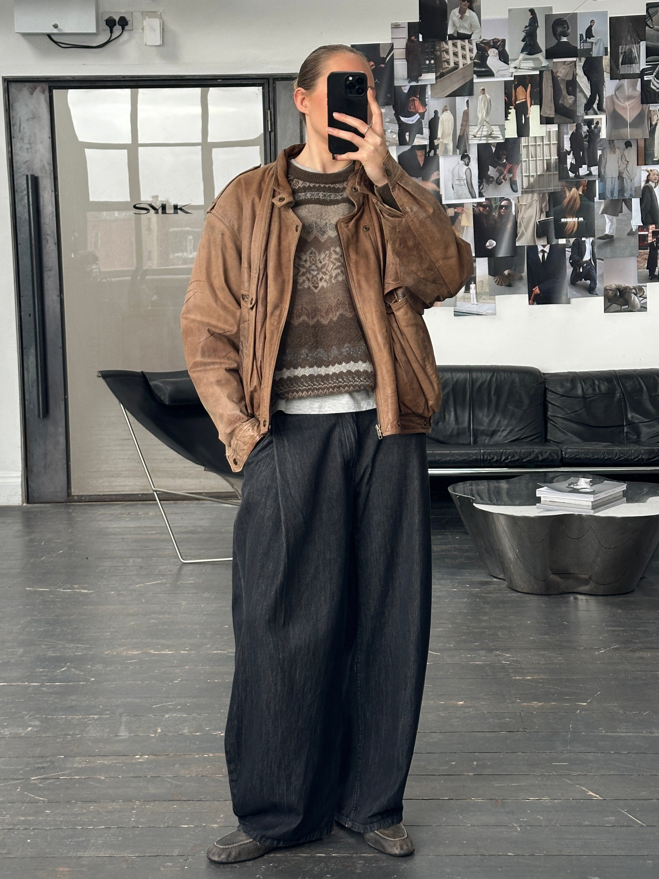 Vintage 1990s high neck aged leather bomber jacket, size M/L, with classic distressed leather and vintage style details.