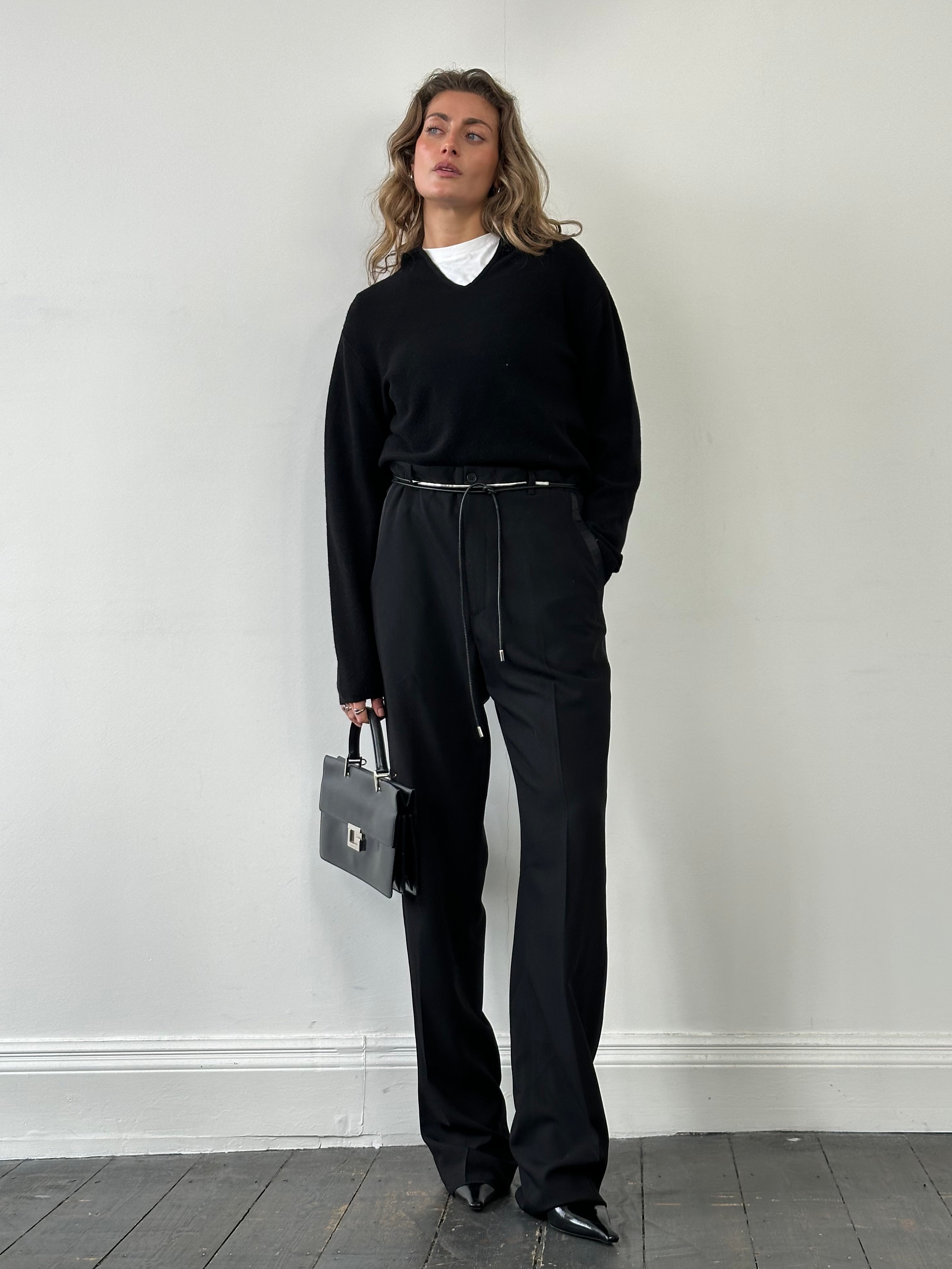 Emporio Armani 1990s pure wool tailored tuxedo trousers in W34, shown in a classic black color with a sleek fit.