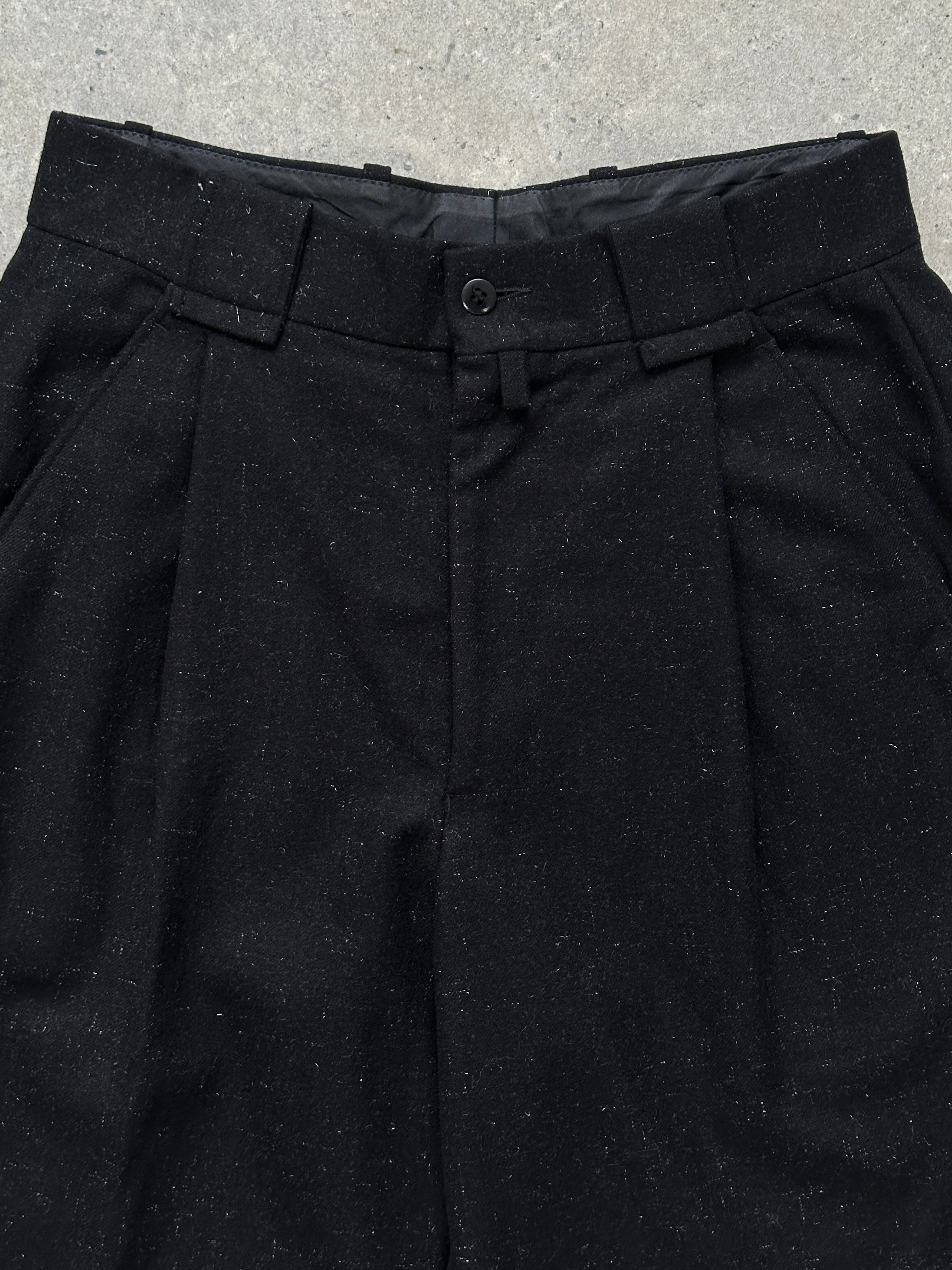 Vintage 1990s Italian wool tailored pleated trousers in size W26, classic retro style with a tailored fit and pleated front.