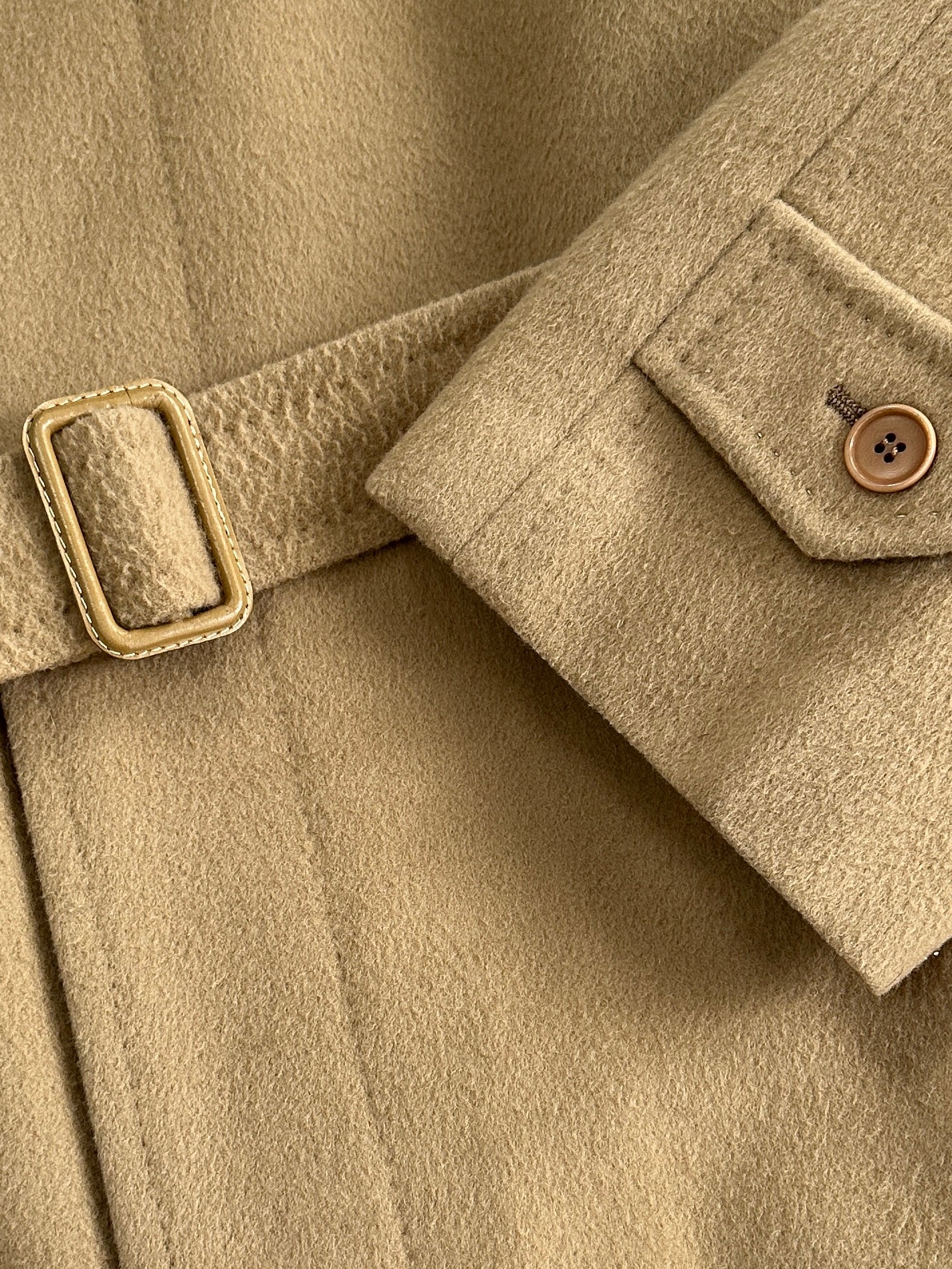 Vintage Italian vintage wool and cashmere coat with concealed placket, belt, in size XL/XXL, displayed on a hanger.