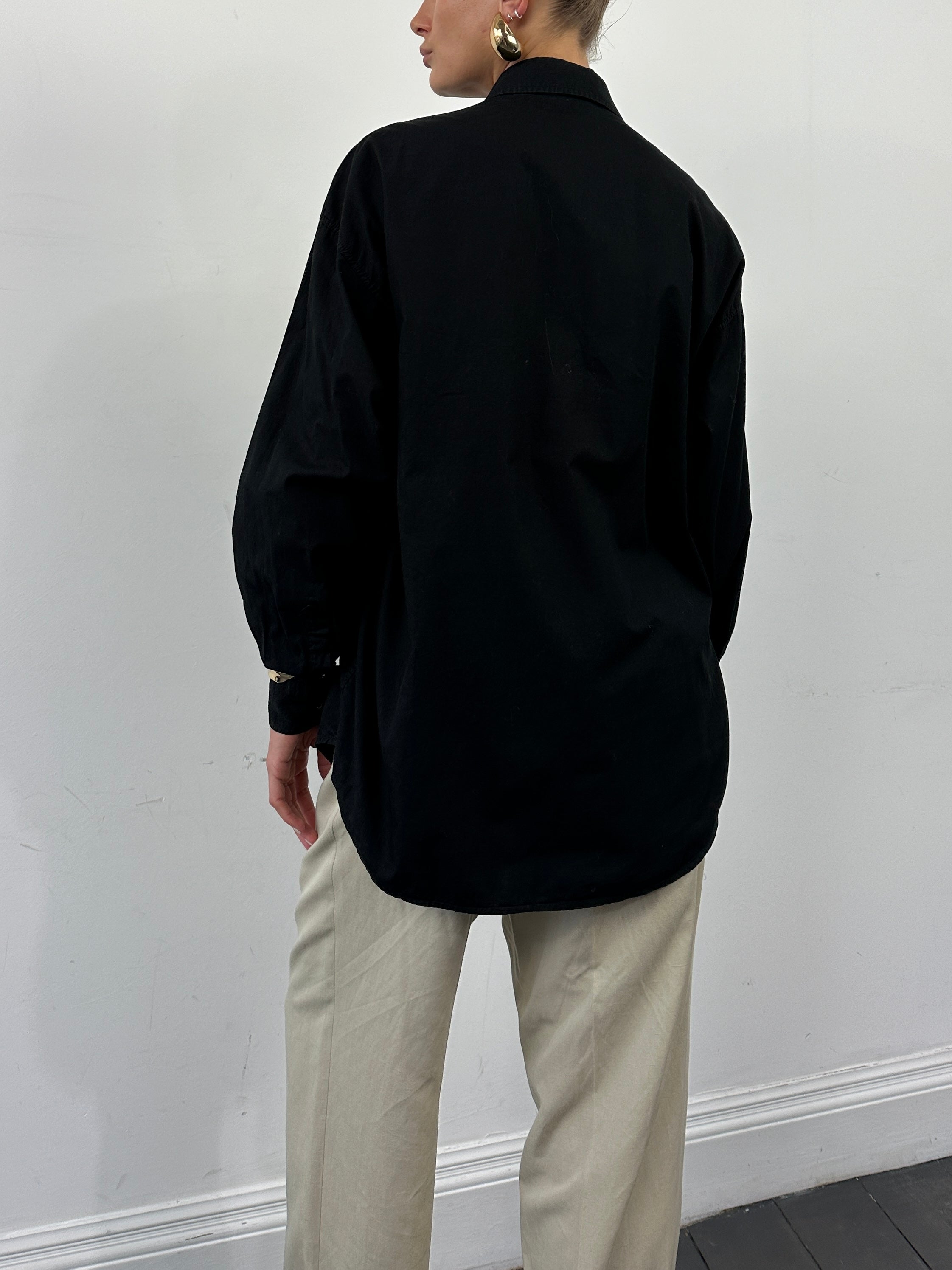 Versace Jeans Couture pure cotton logo shirt in XL, featuring a stylish design and classic fit, displayed on a hanger.