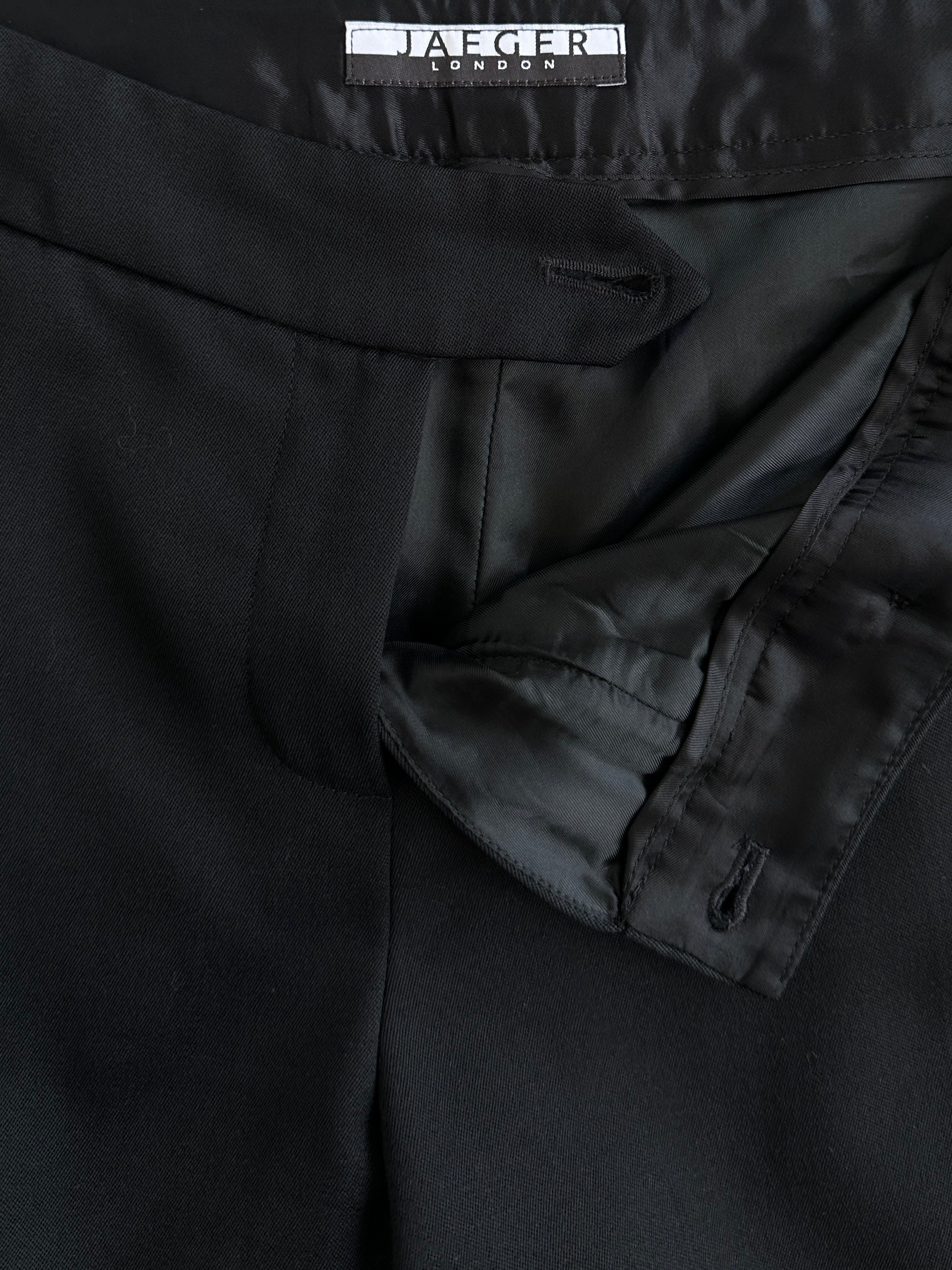 Jaeger pure wool low waist straight leg culottes shorts in neutral color, displayed flat with waistband and leg opening visible.