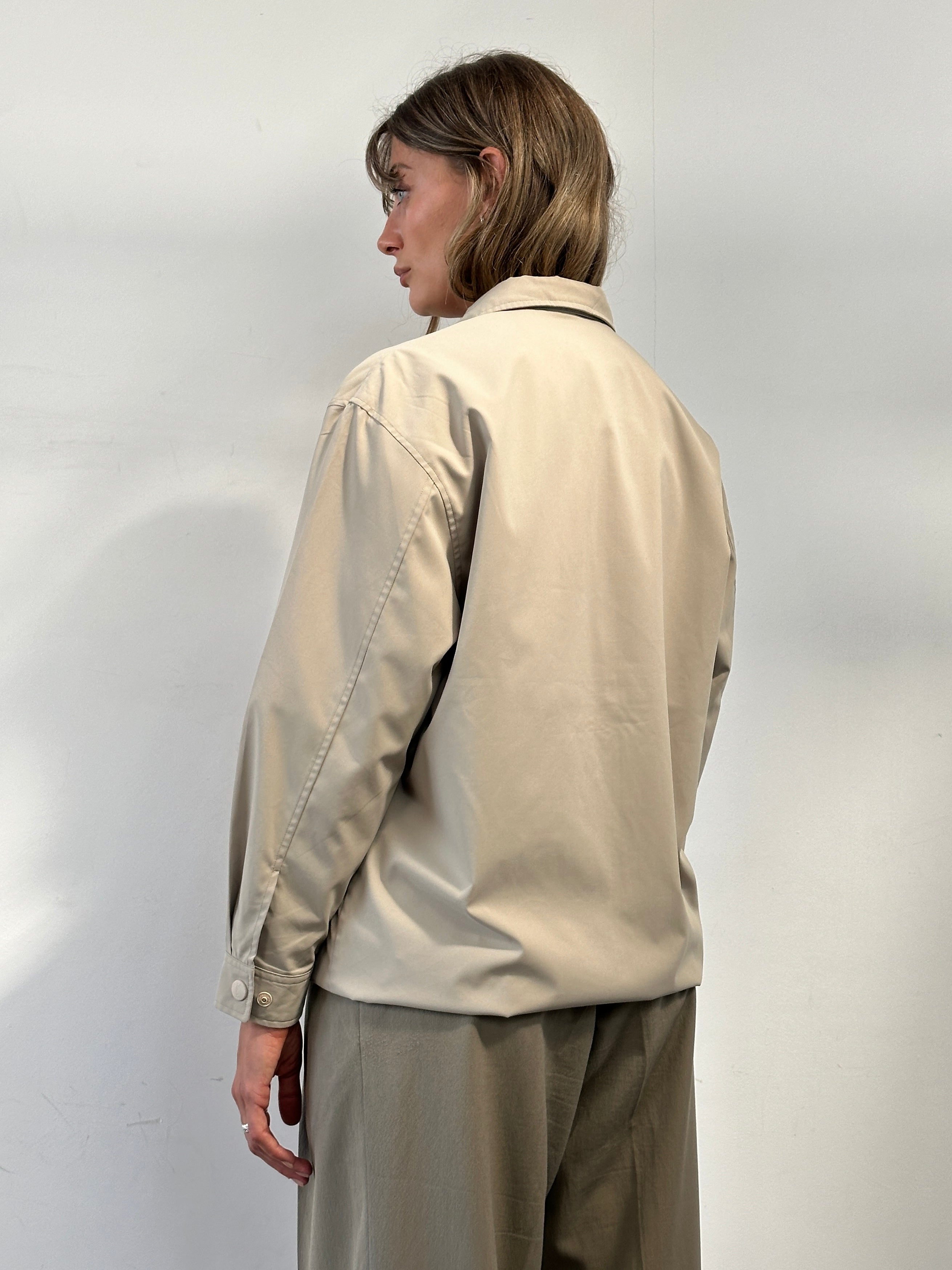 Yves Saint Laurent Pour Homme logo bomber jacket in black, front view showing signature branding and stylish design.