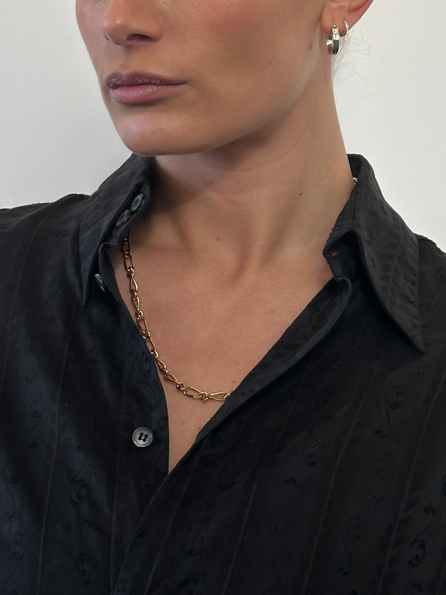 Gold plated Pierre Cardin necklace featuring a sleek chain design, elegant and perfect for adding a touch of luxury to any outfit.