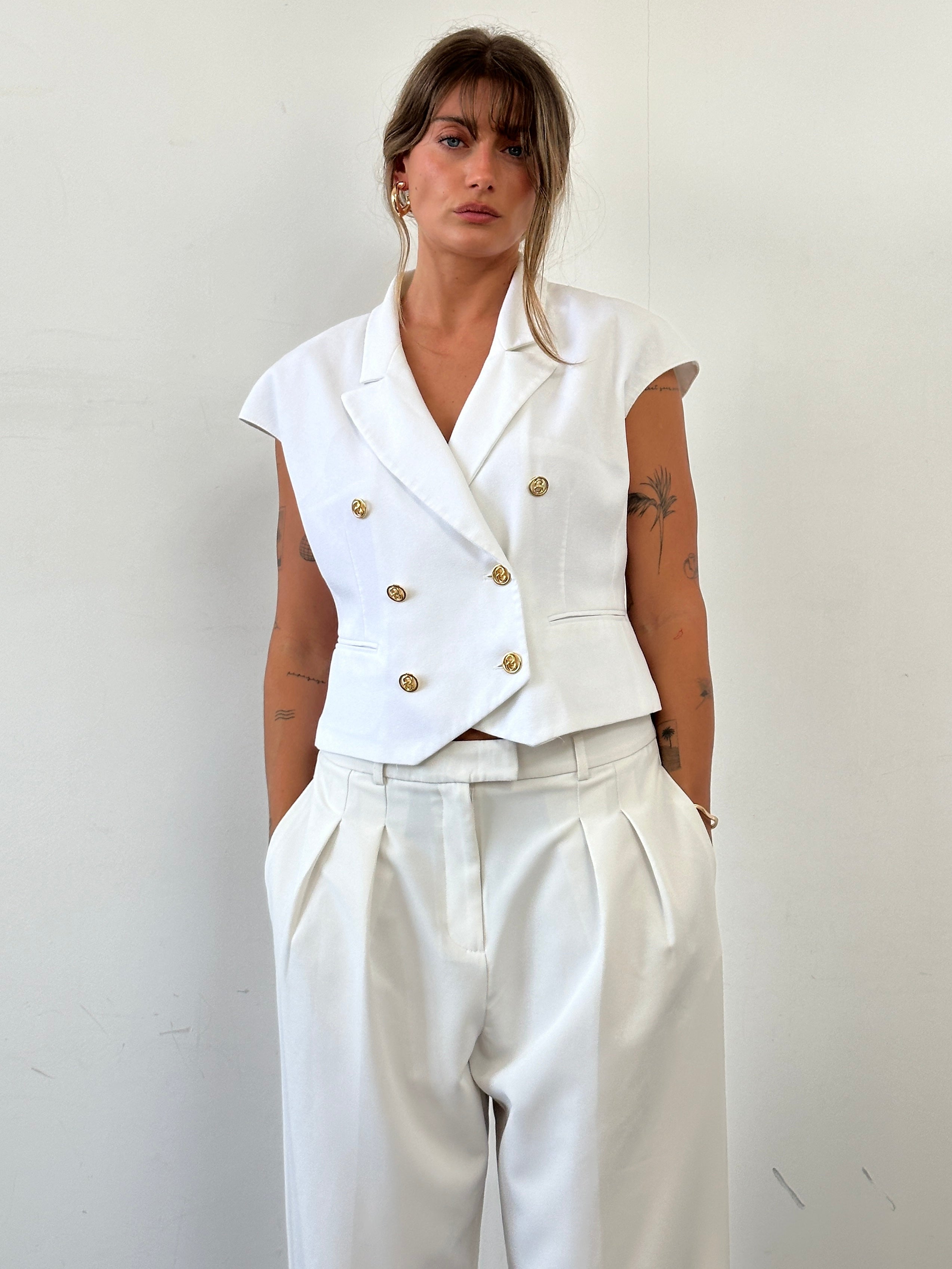 St Michael circa 90s double-breasted waistcoat in black, tailored fit, vintage men's fashion, front view showing lapels and buttons.