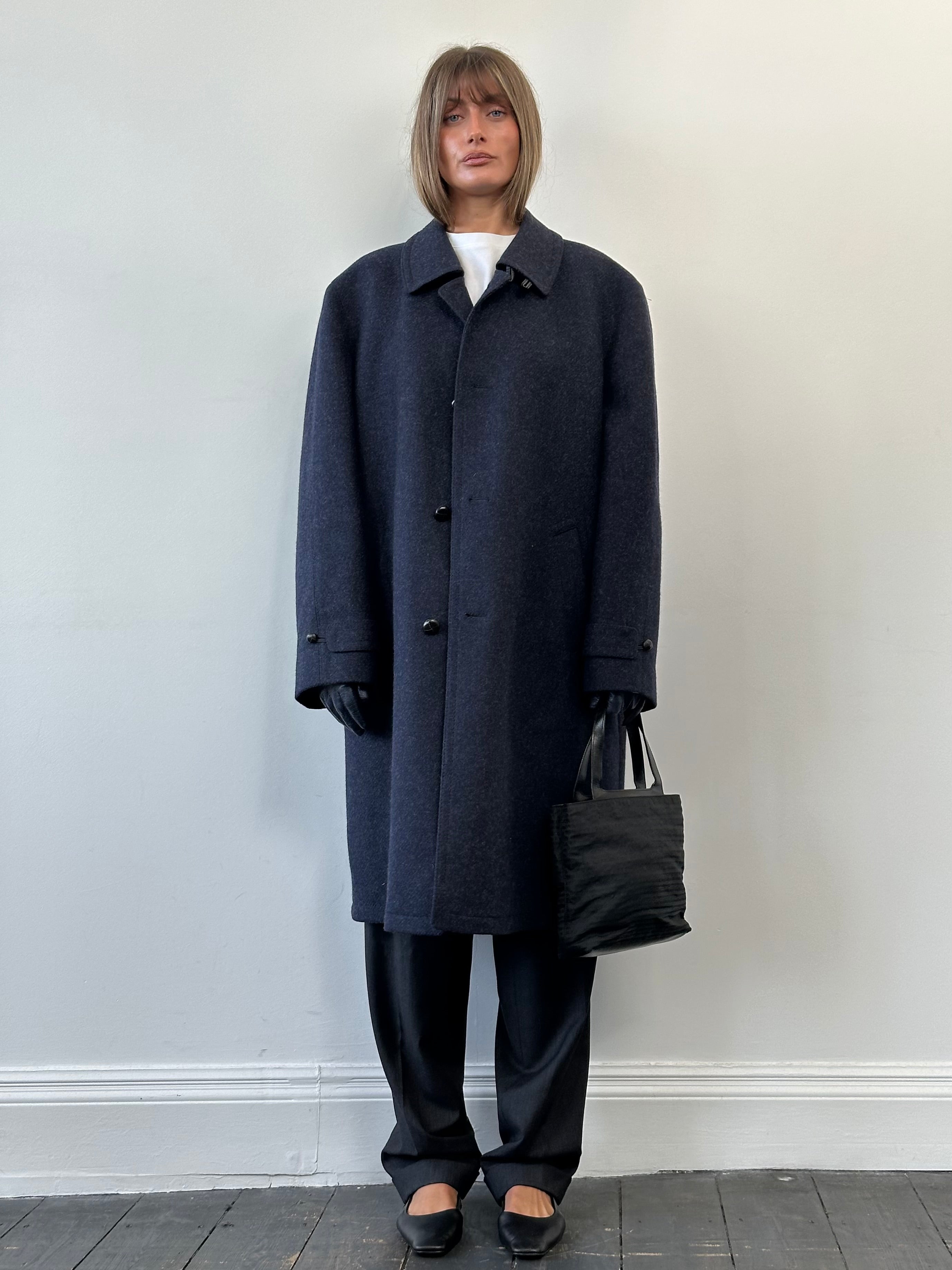 Vintage 1990s pure wool high neck single-breasted coat in XL/XXL size, featuring classic design and warm, textured fabric.