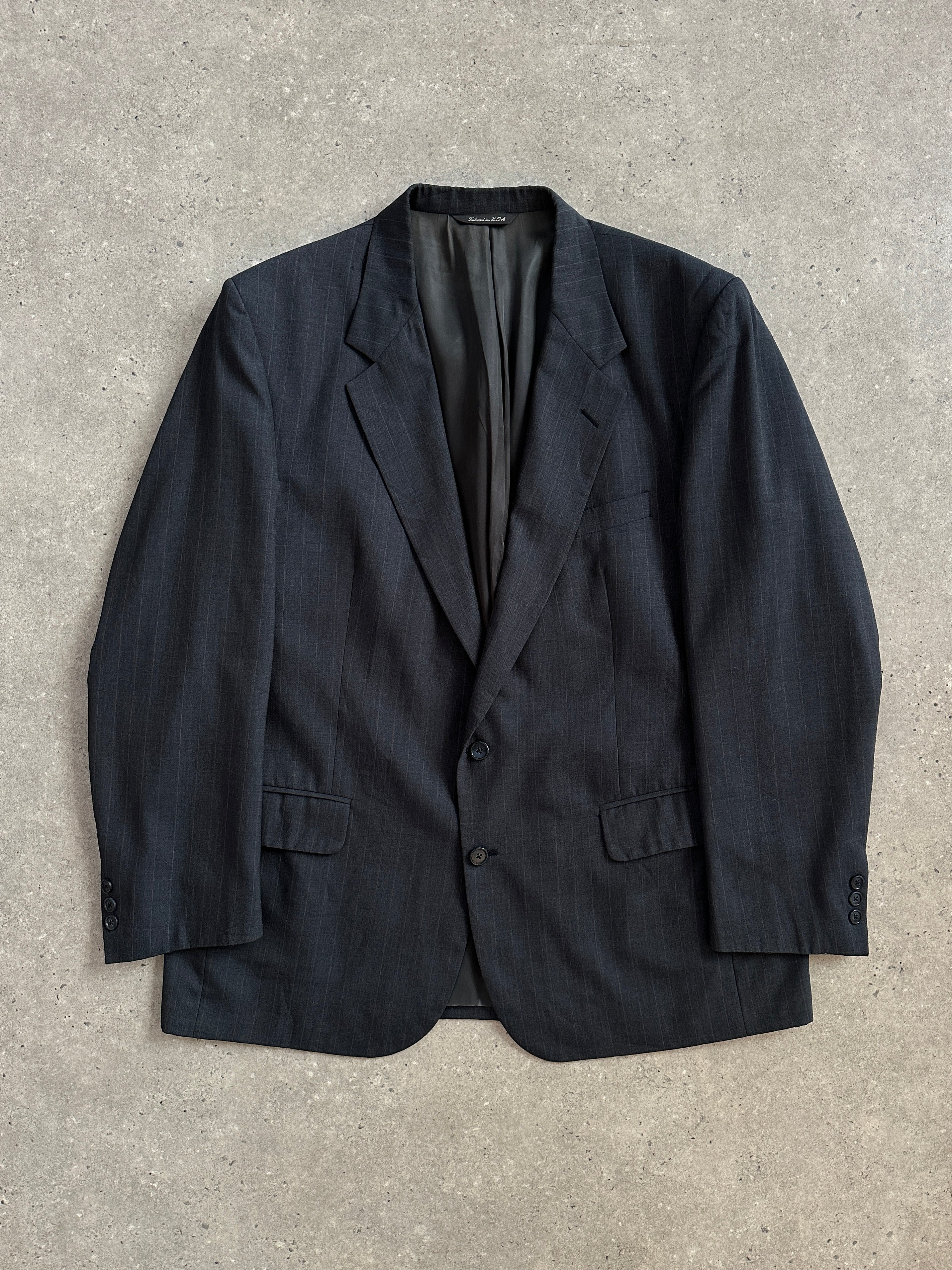 Christian Dior Monsieur 1990s wool stripe blazer in size 46R/XXL, showcasing classic tailored fit and bold striped pattern.