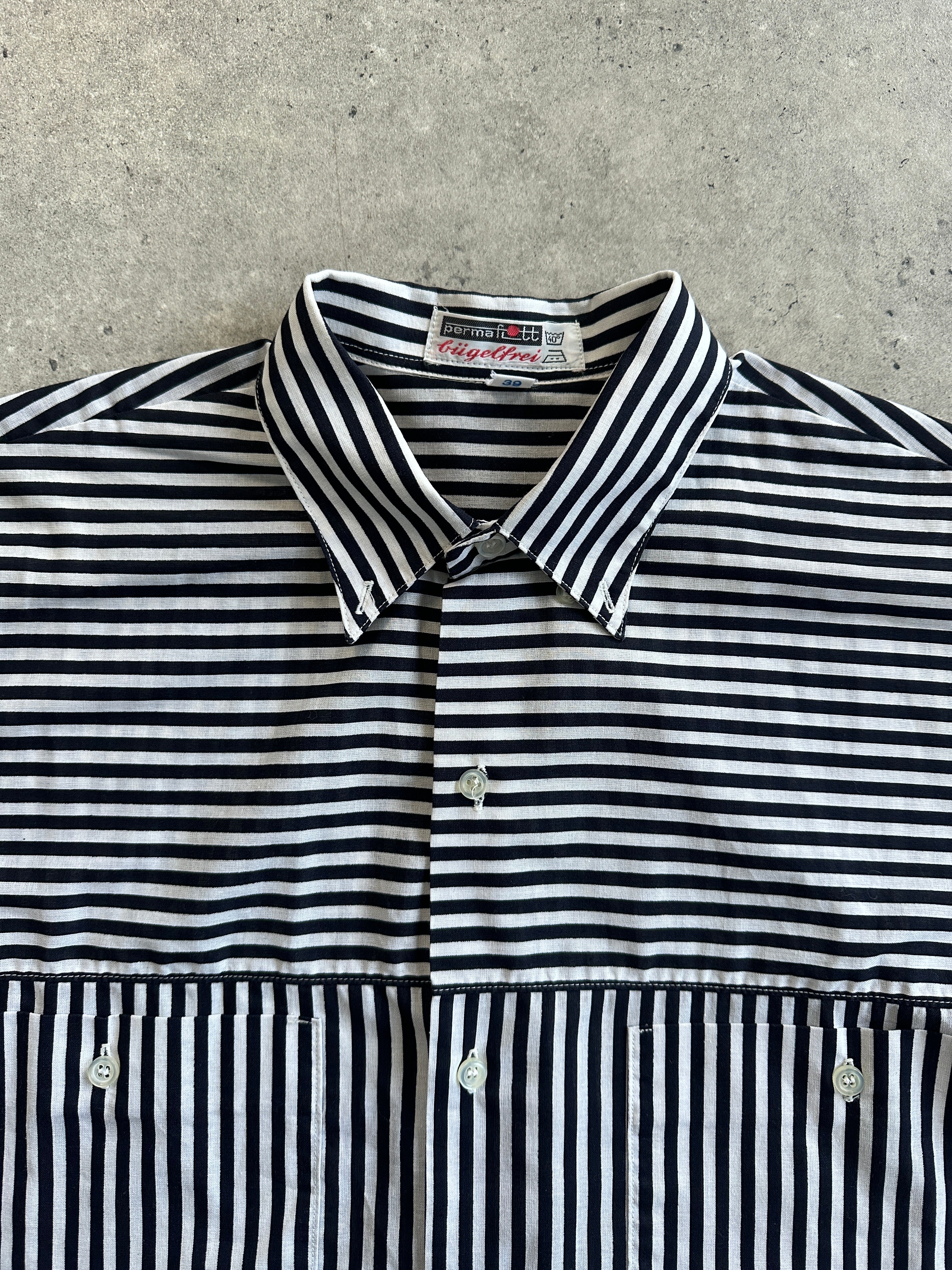 Vintage brand vintage stripe shirt in XL size, featuring classic striped pattern and button-front design.