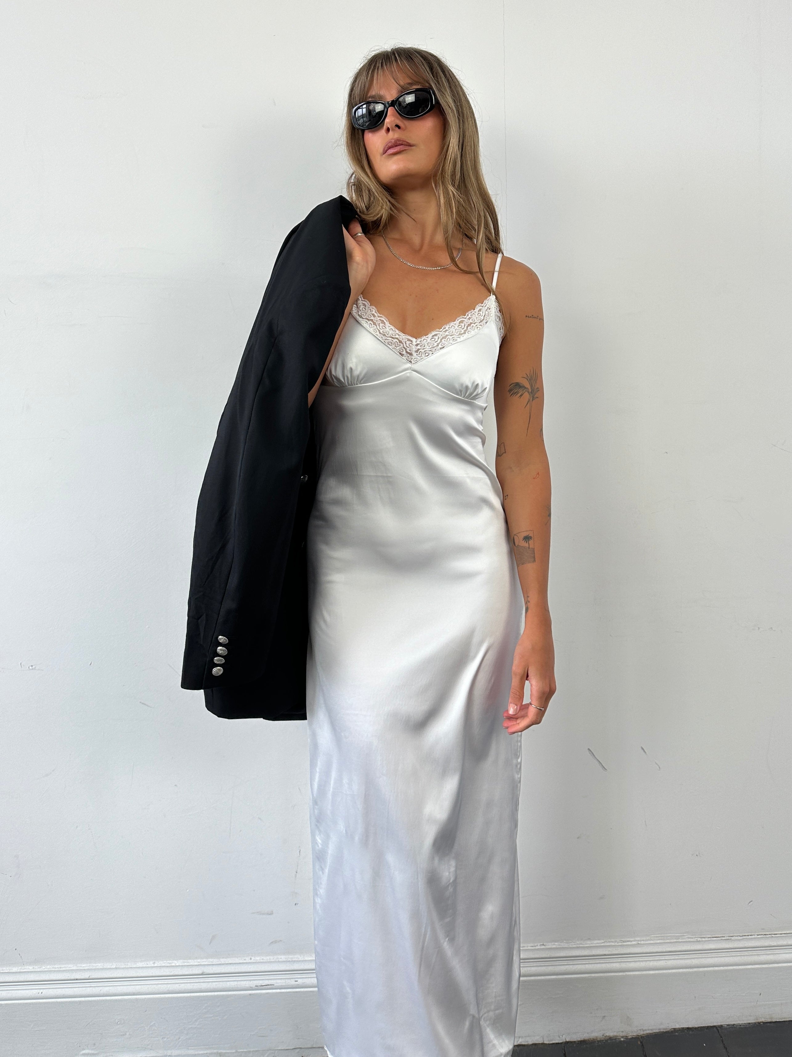 Vintage satin lace trim floor length slip dress in size small, featuring elegant vintage design and delicate lace details.