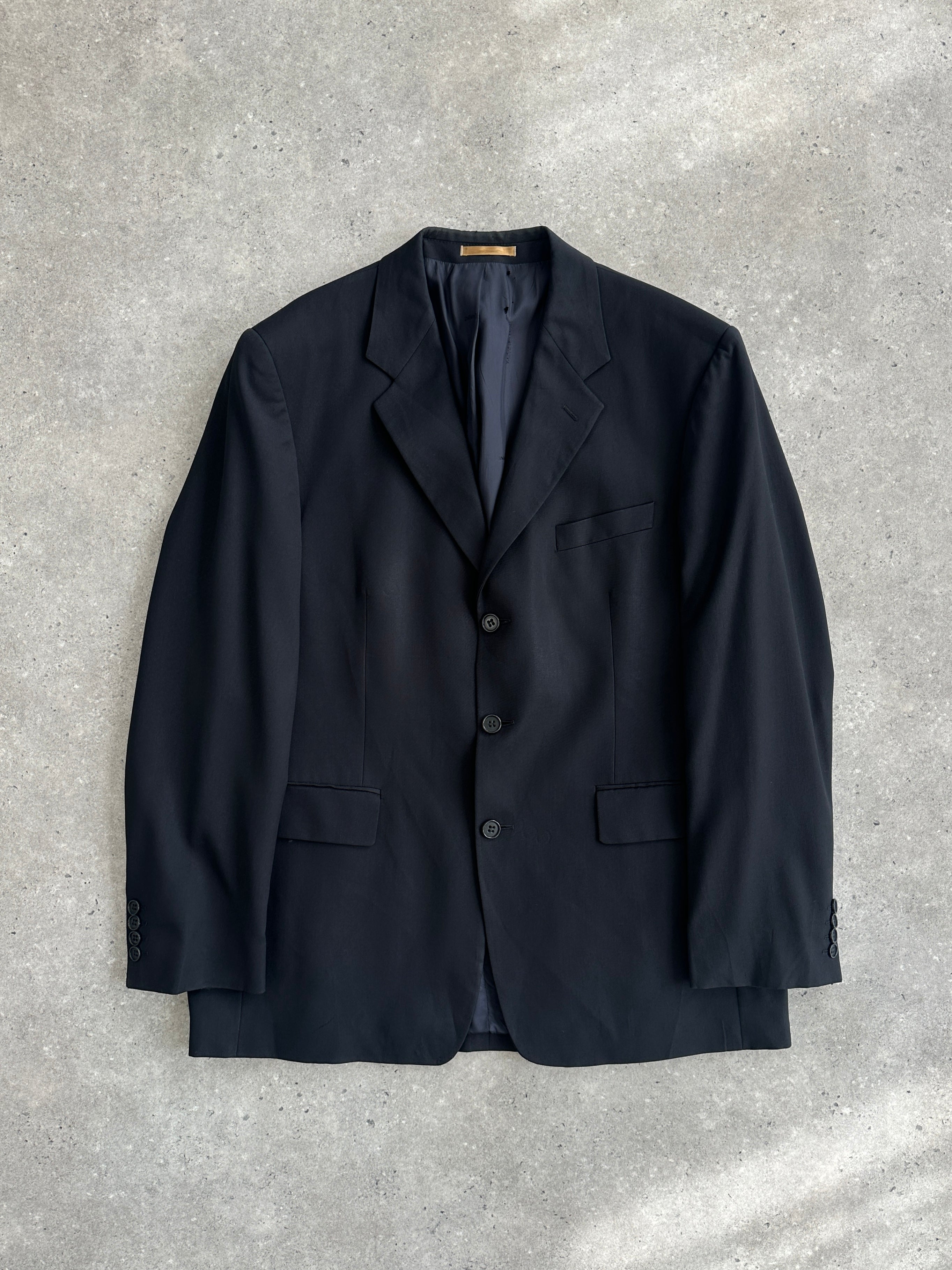 Yves Saint Laurent men's 1990s pure wool blazer, size 44R/XL, classic tailored design in dark color, displayed on a hanger.