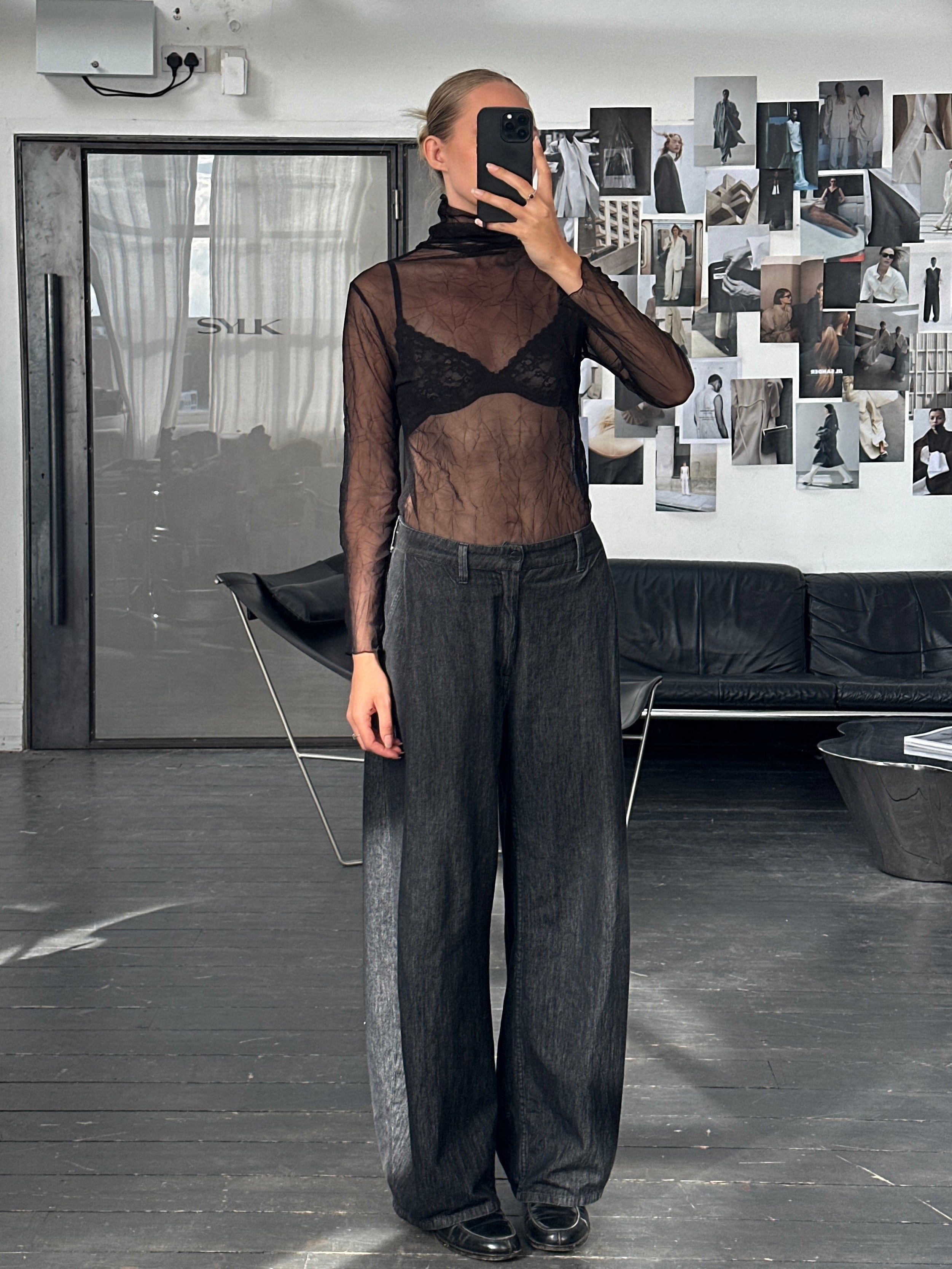 Vintage 2000s sheer crinkled roll neck tank top in black, with a fitted style and lightweight, textured fabric.