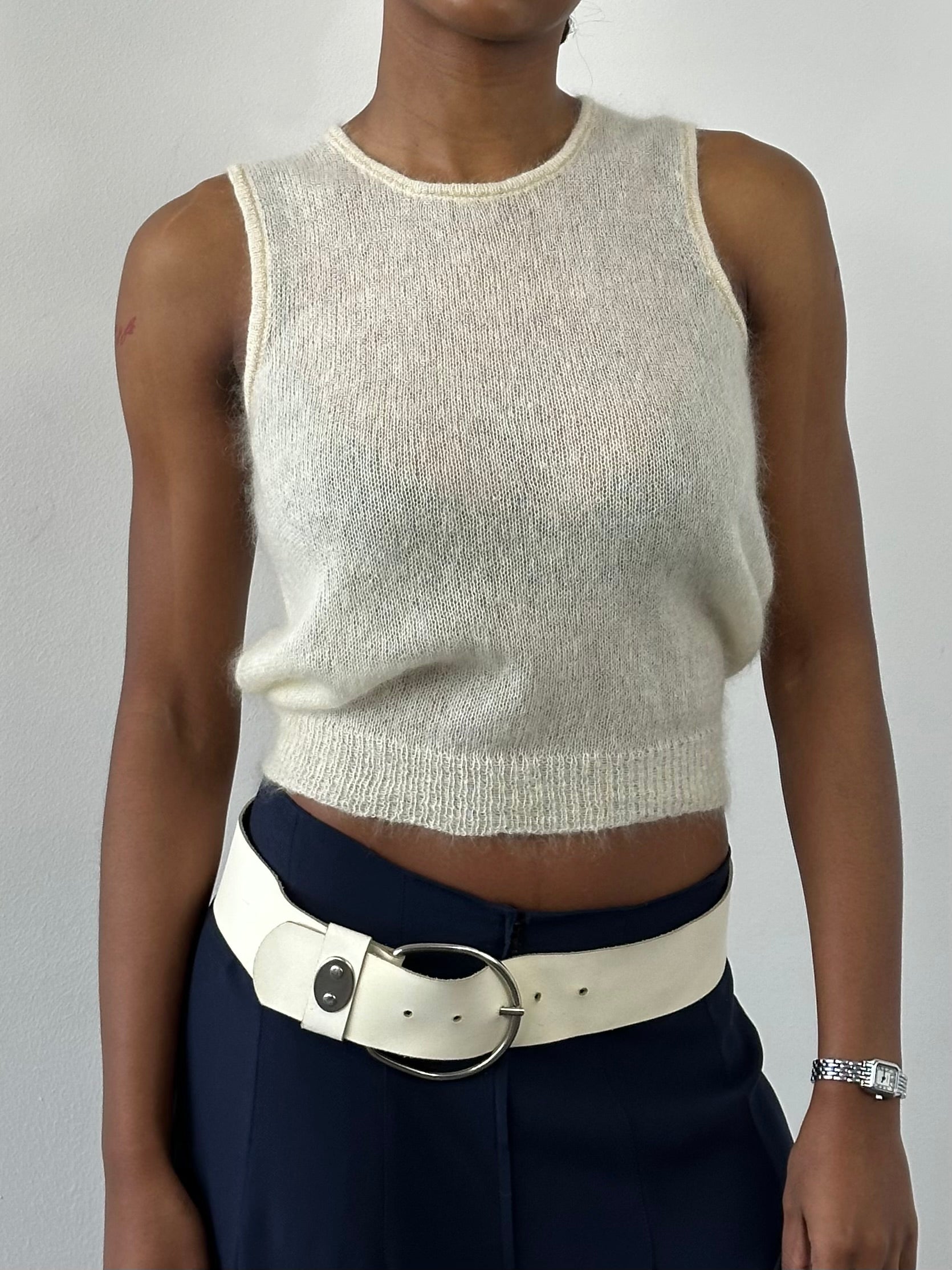 Vintage Italian 1990s mohair knit top in soft beige, size small, featuring a cozy, textured knit pattern.