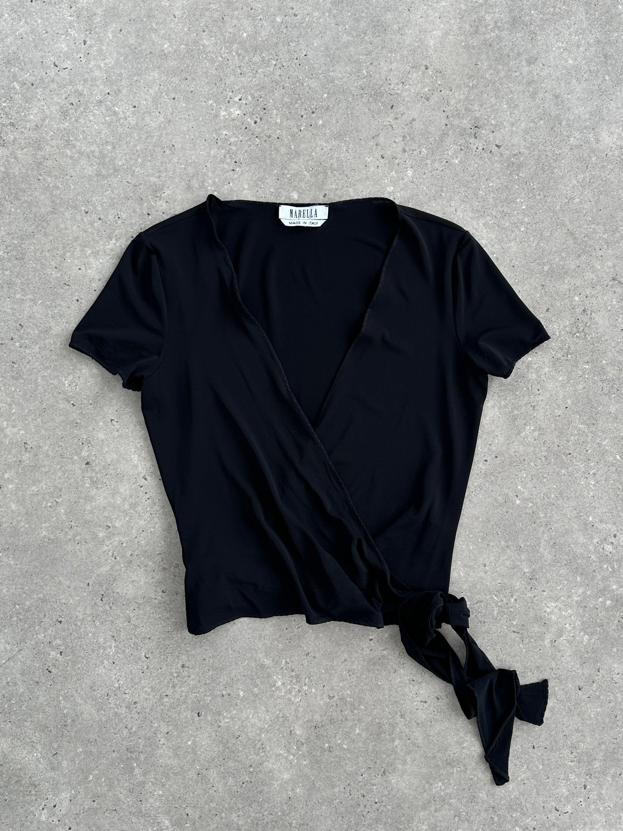 Marella tie wrap top in size M, featuring a stylish neckline and wrap design, made from lightweight fabric.