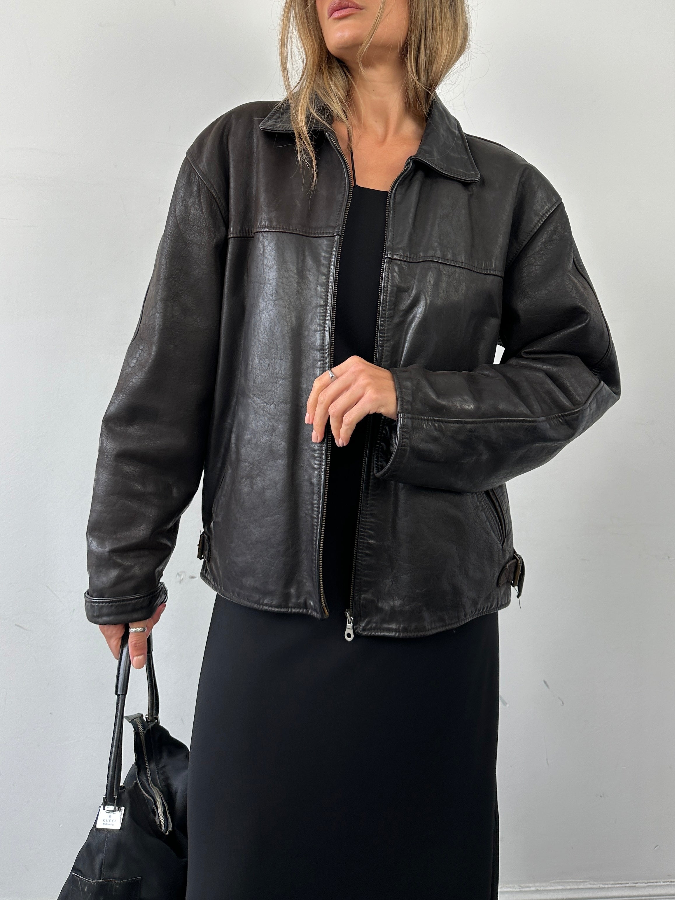 Vintage Italian leather jacket in size L, showcasing classic vintage style and durable leather texture.
