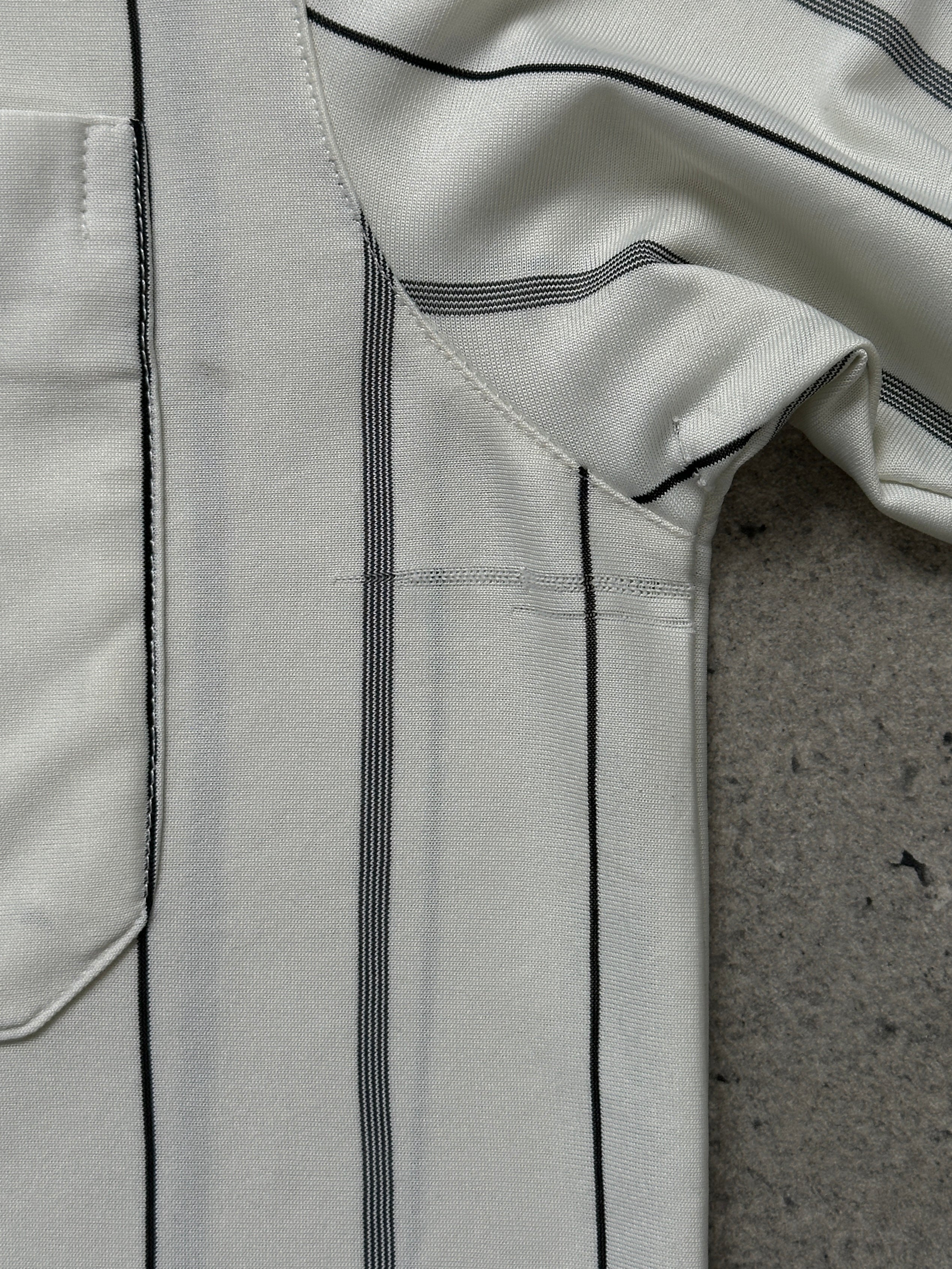 Yves Saint Laurent 1990s pure silk stripe polo shirt in size M, featuring a classic collar and multicolored striped pattern.