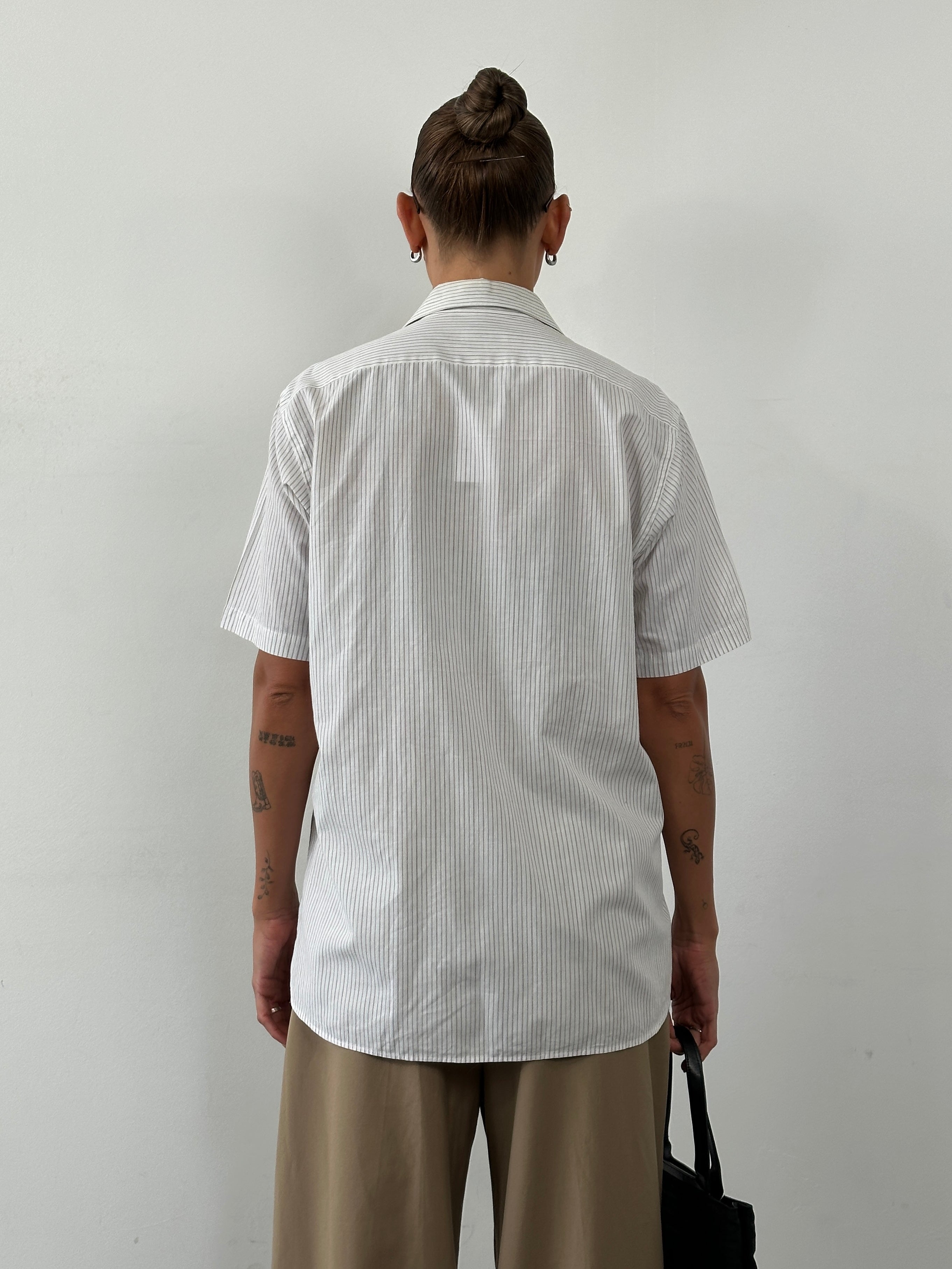 Christian Dior stripe cotton logo shirt in size M/L, featuring a stylish design with the Dior brand logo and classic striped pattern.