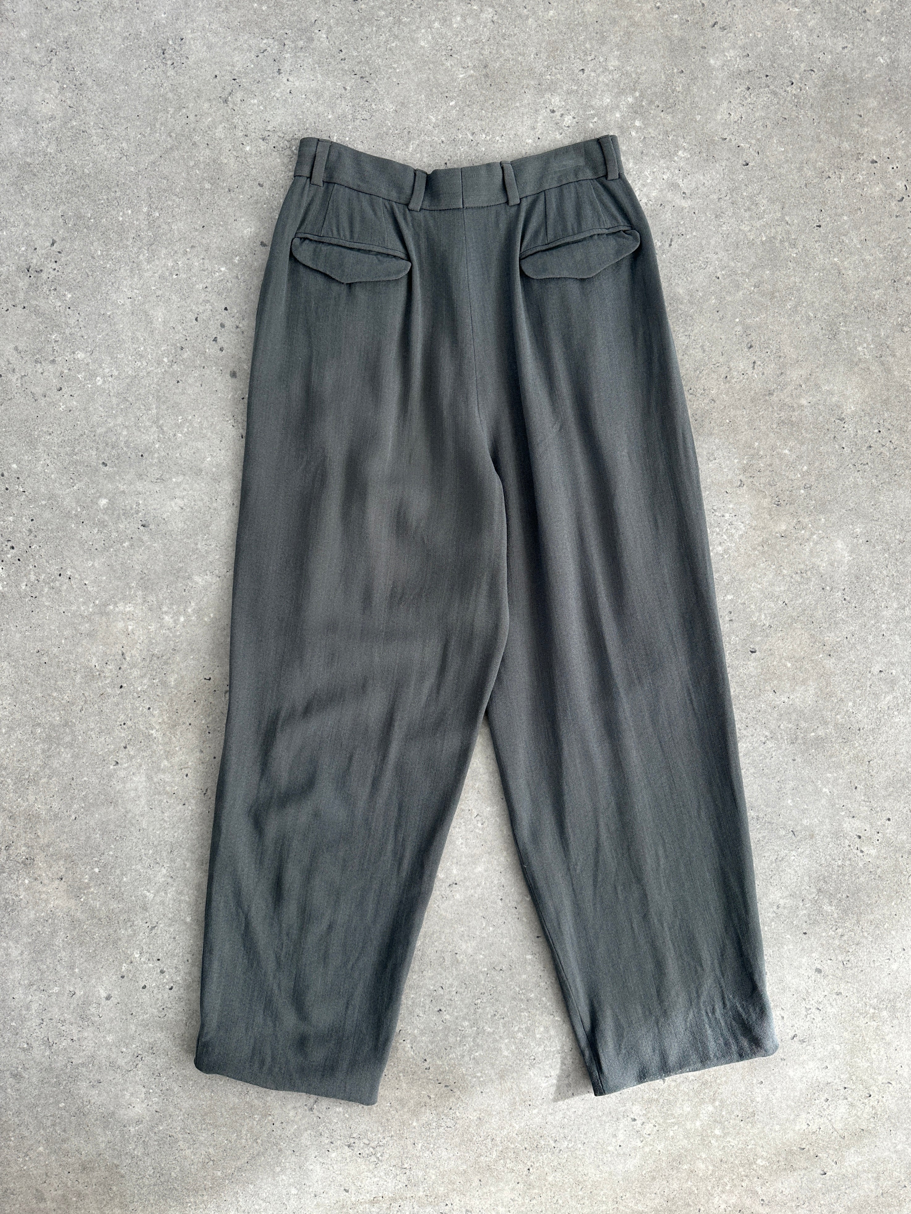 Giorgio Armani high-waisted tapered leg pleated trousers in neutral fabric, showcasing a tailored fit and elegant design.