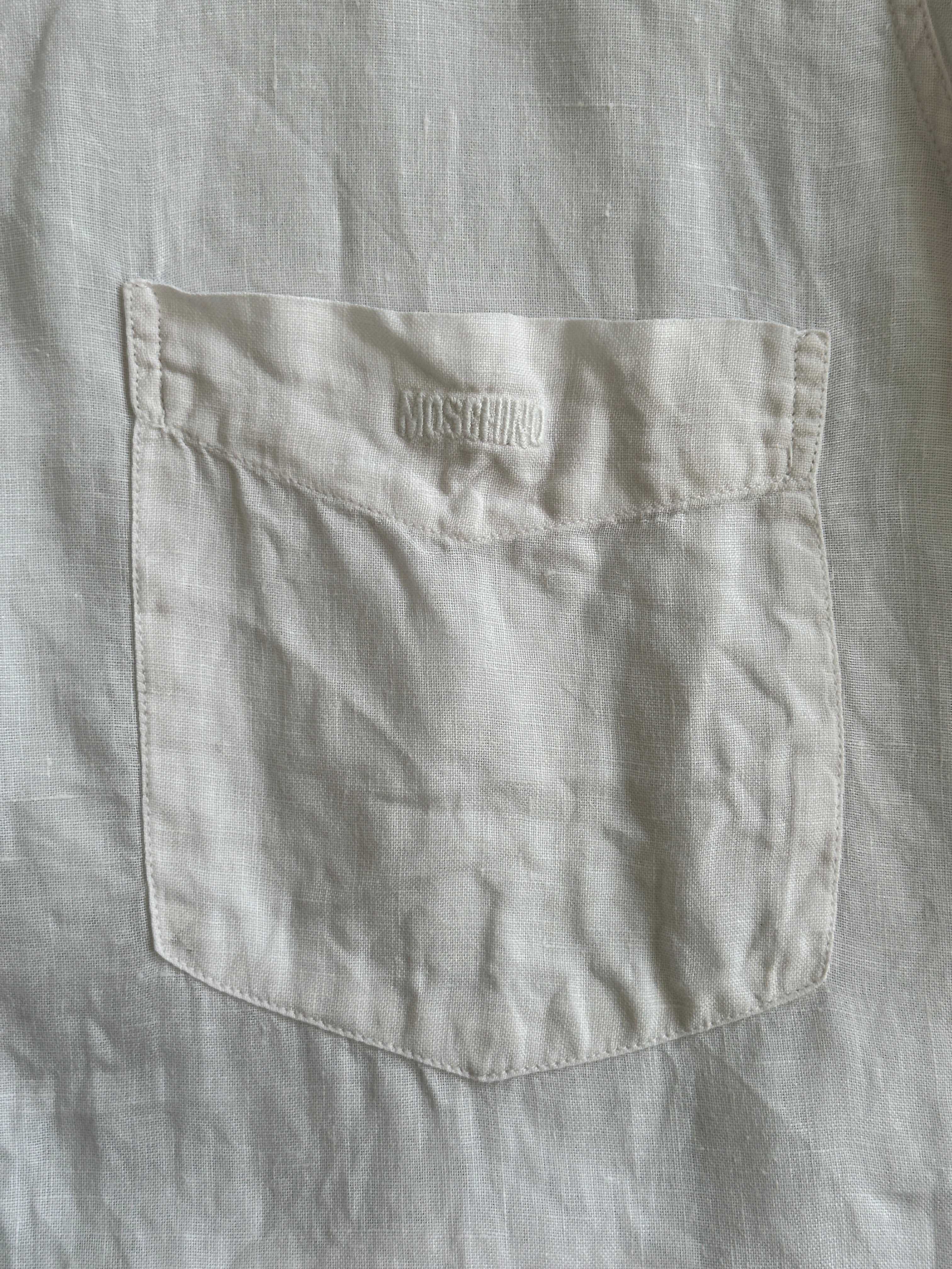 Moschino pure linen logo short sleeve shirt in size L/XL, featuring a casual fit with Moschino branding on the chest.