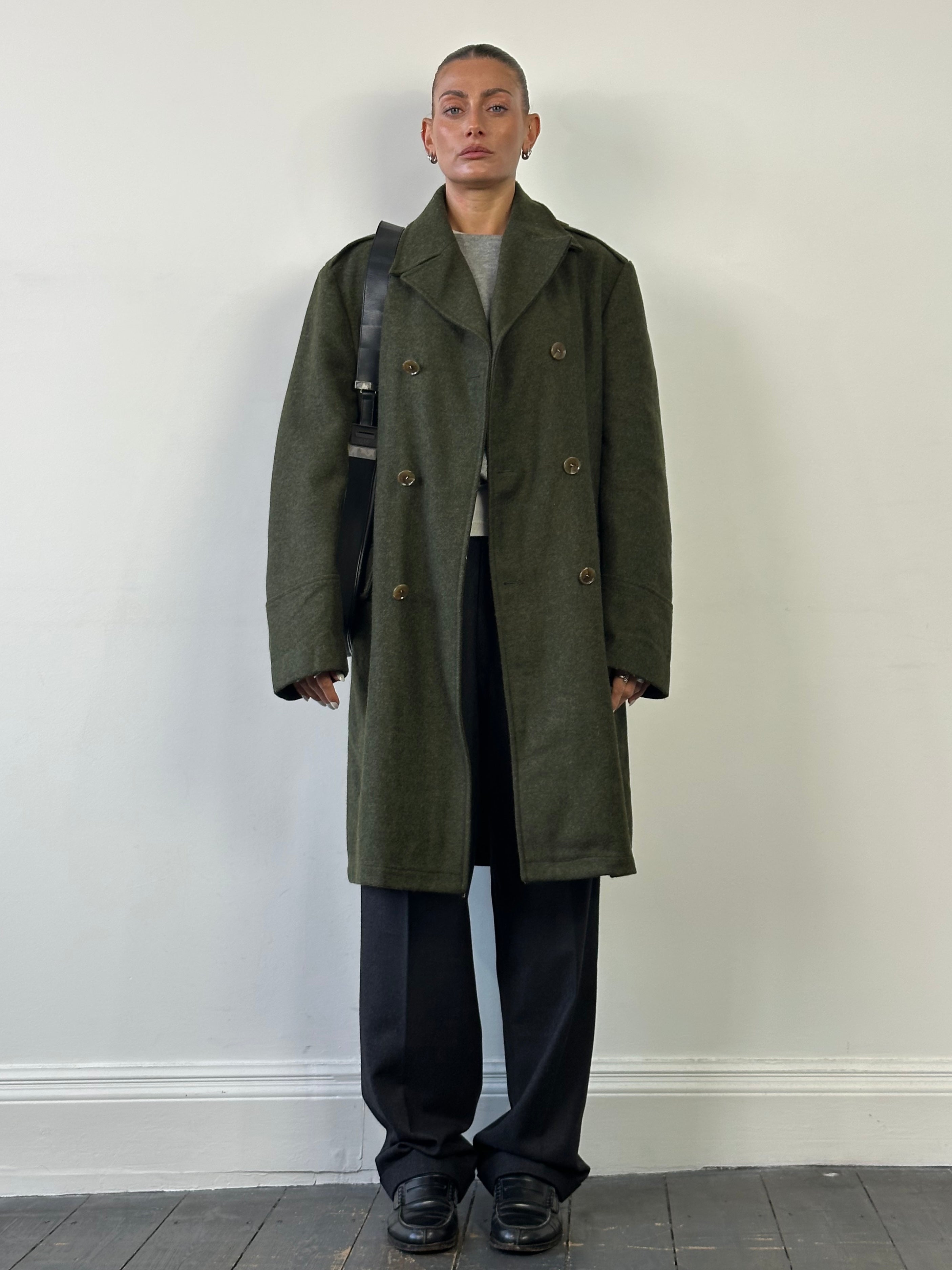 Dolce & Gabbana 1990s wool double-breasted coat in size L/XL, featuring classic tailored design and luxurious fabric.