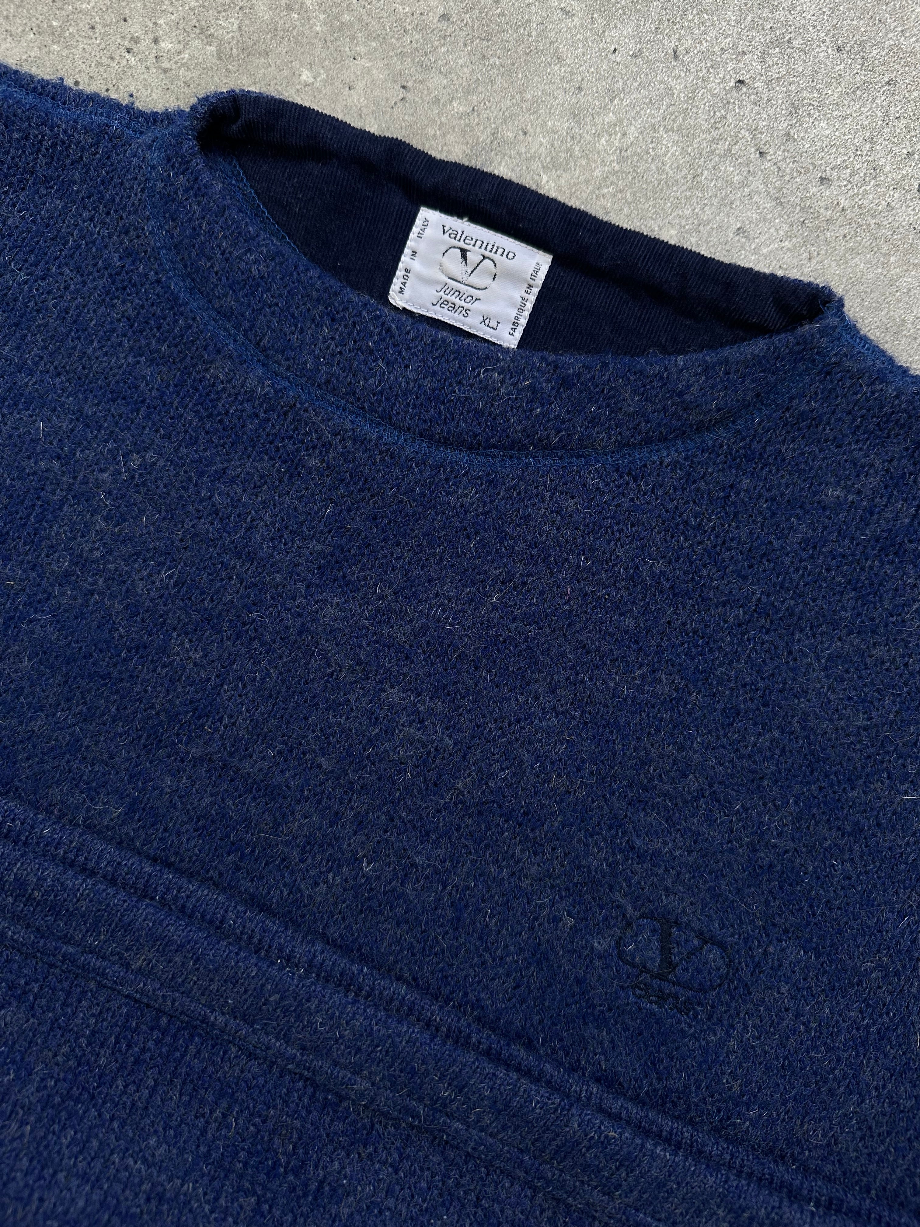 Valentino 1990s wool logo cropped knitted jumper in black, showing the front with Valentino branding and ribbed cuffs.