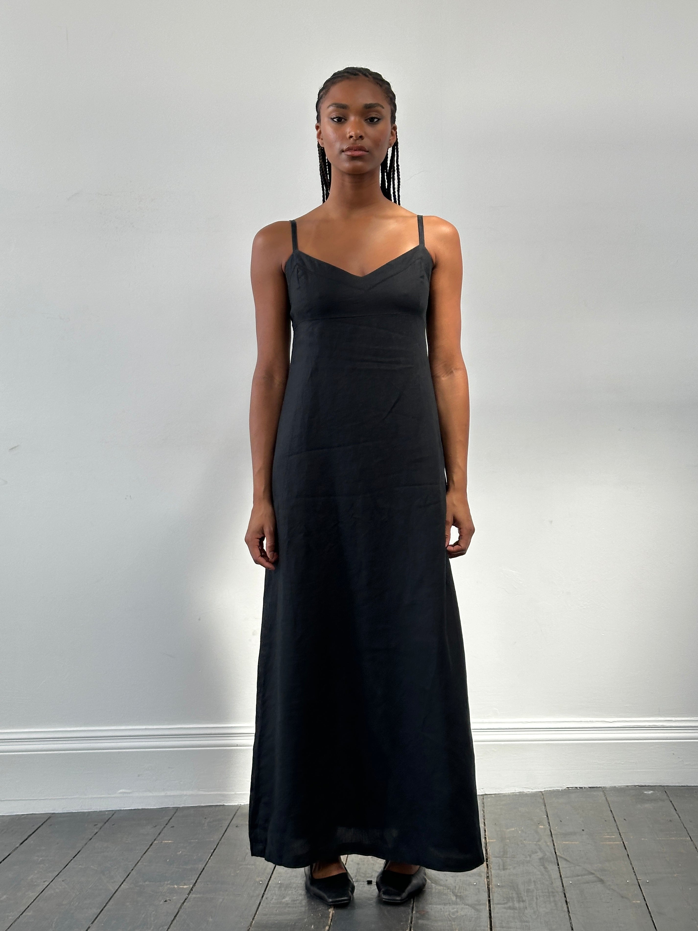 Armani Exchange pure linen maxi dress in size small, featuring a flowing design and sleeveless style, ideal for warm-weather wear.