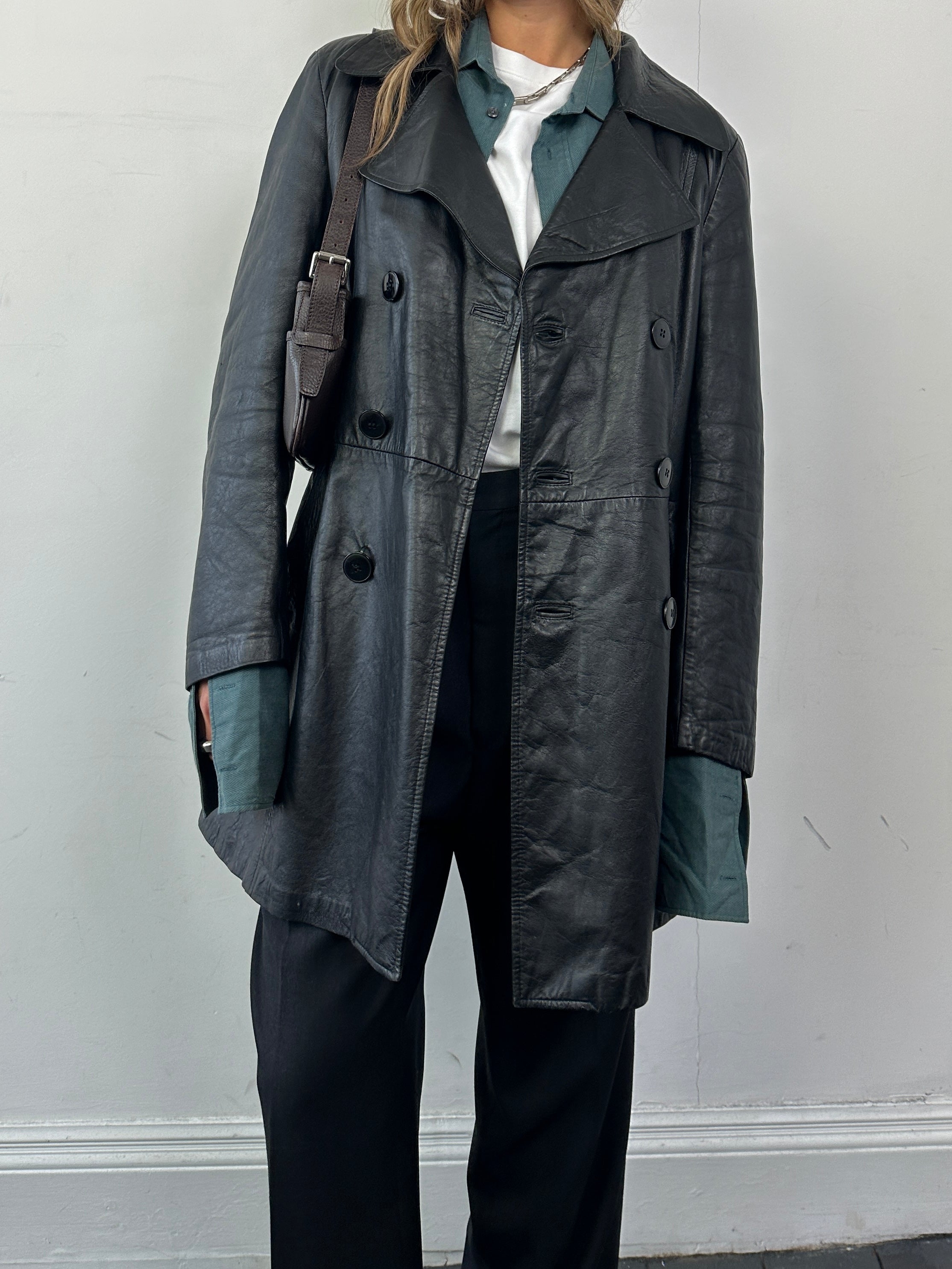 Vintage Italian leather double-breasted mid-length jacket in S/M size, featuring classic design and craftsmanship.