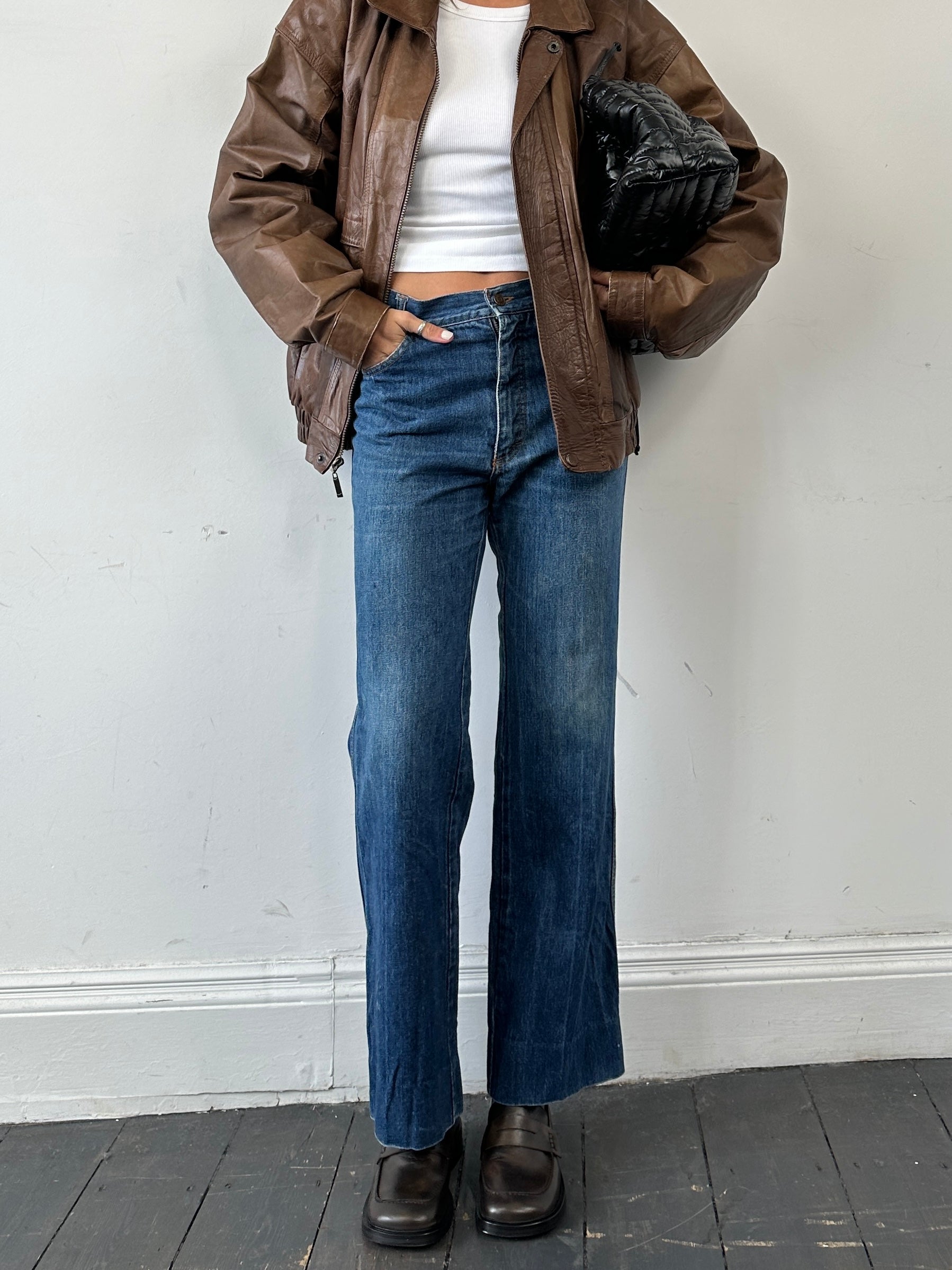 Carrera Italian straight leg denim jeans in size W30, featuring classic blue wash and stitching details.
