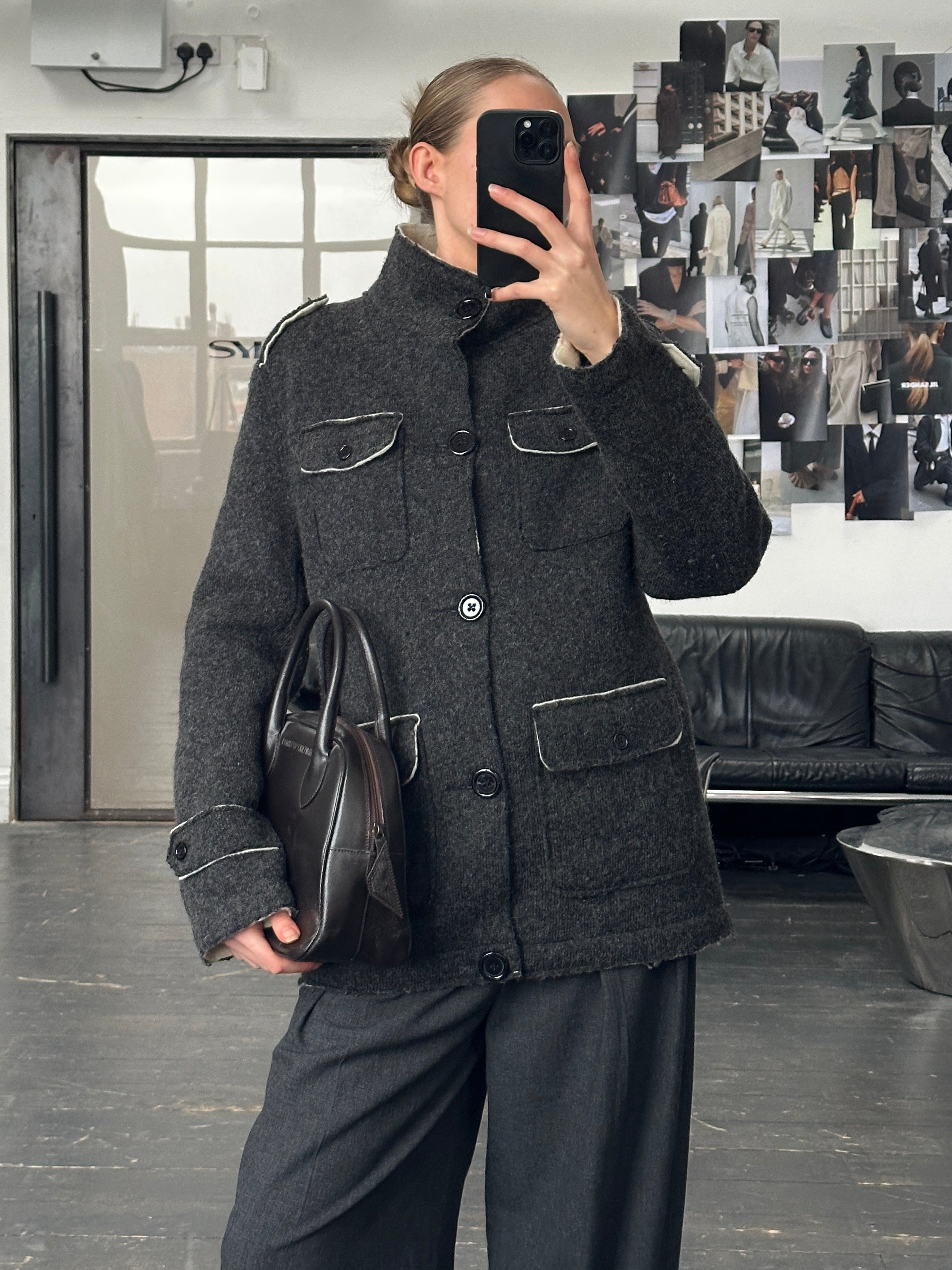 Vintage 1990s wool high neck utility jacket in size large, featuring classic design and durable fabric.