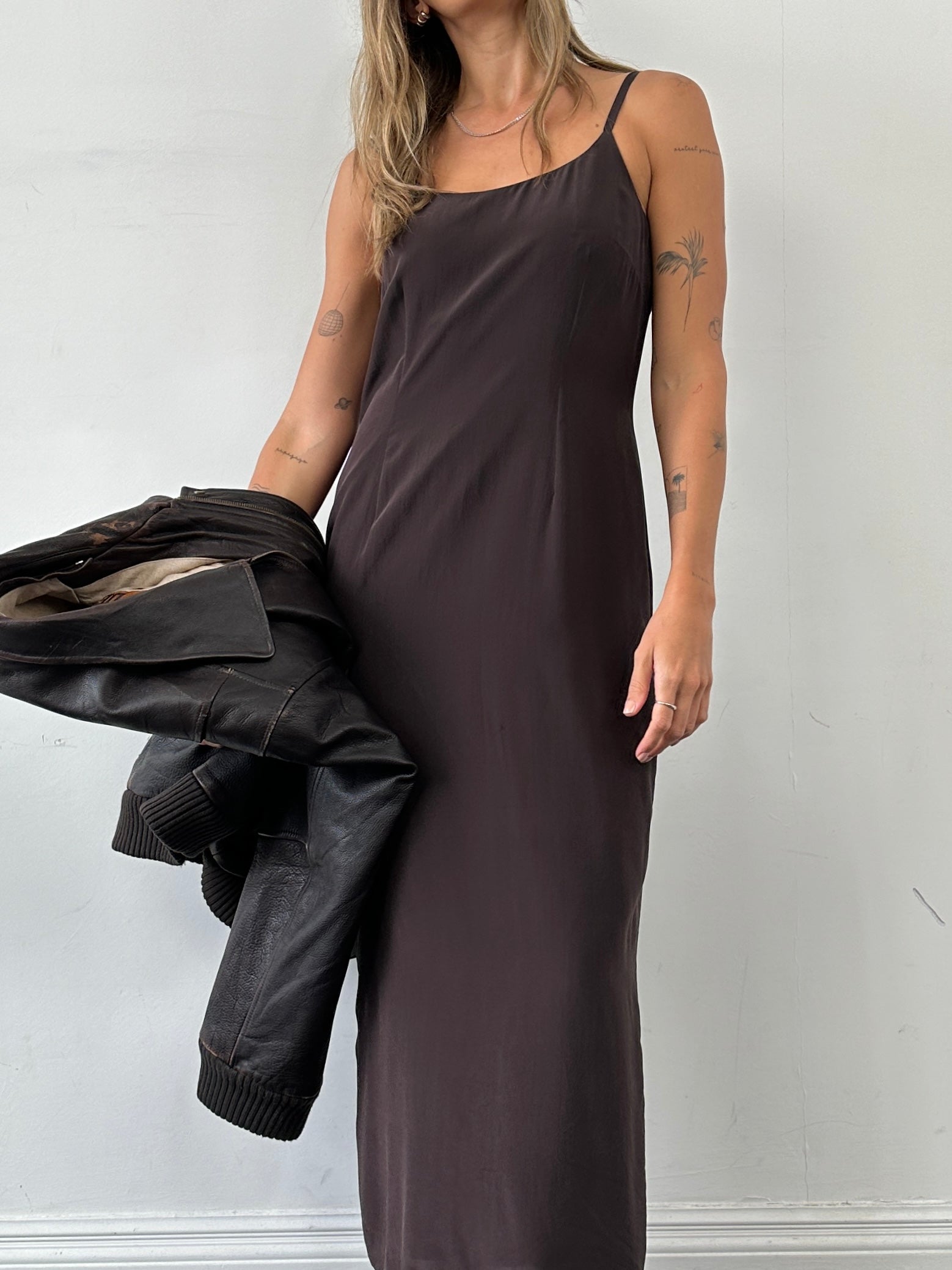 Laura Ashley pure silk floor-length slip dress in size M, elegant sleeveless design with a smooth, flowing fabric.