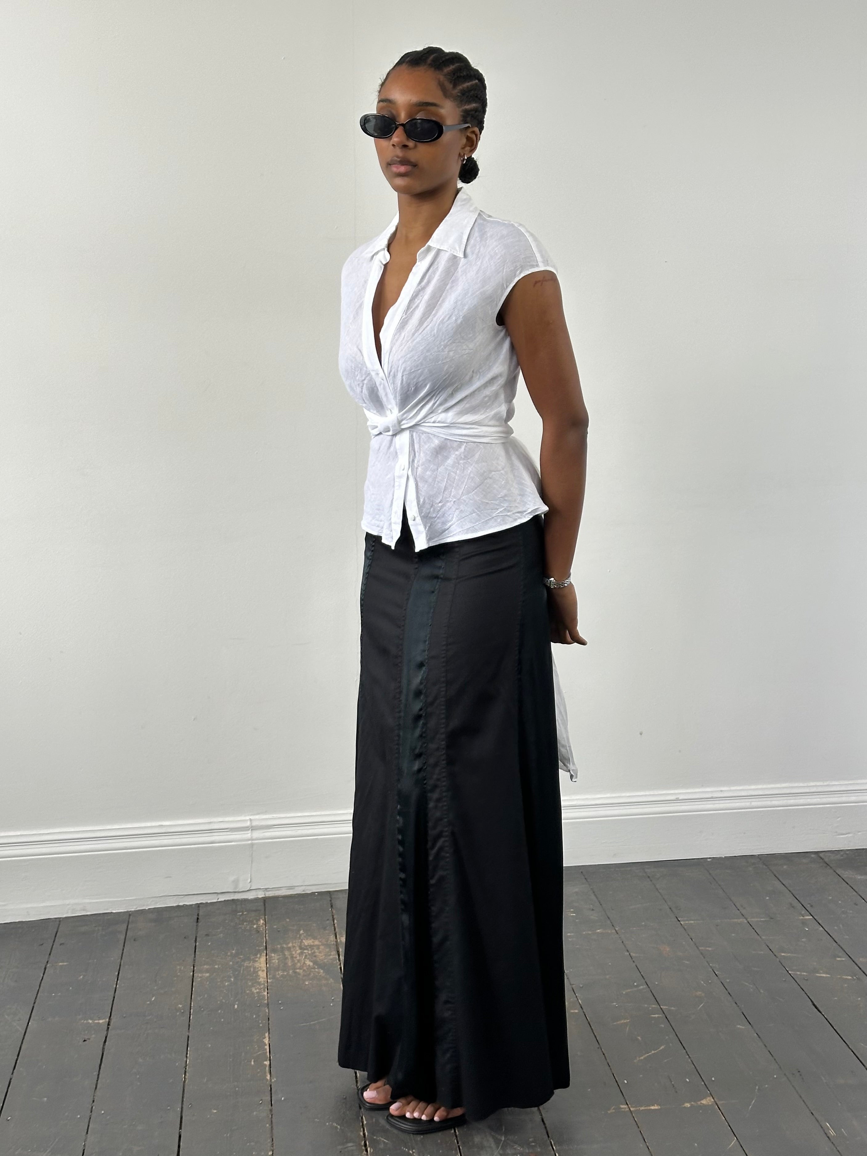 Vintage DKNY 2000s cotton panelled skirt in W28, featuring a classic A-line design with color-blocked panels.