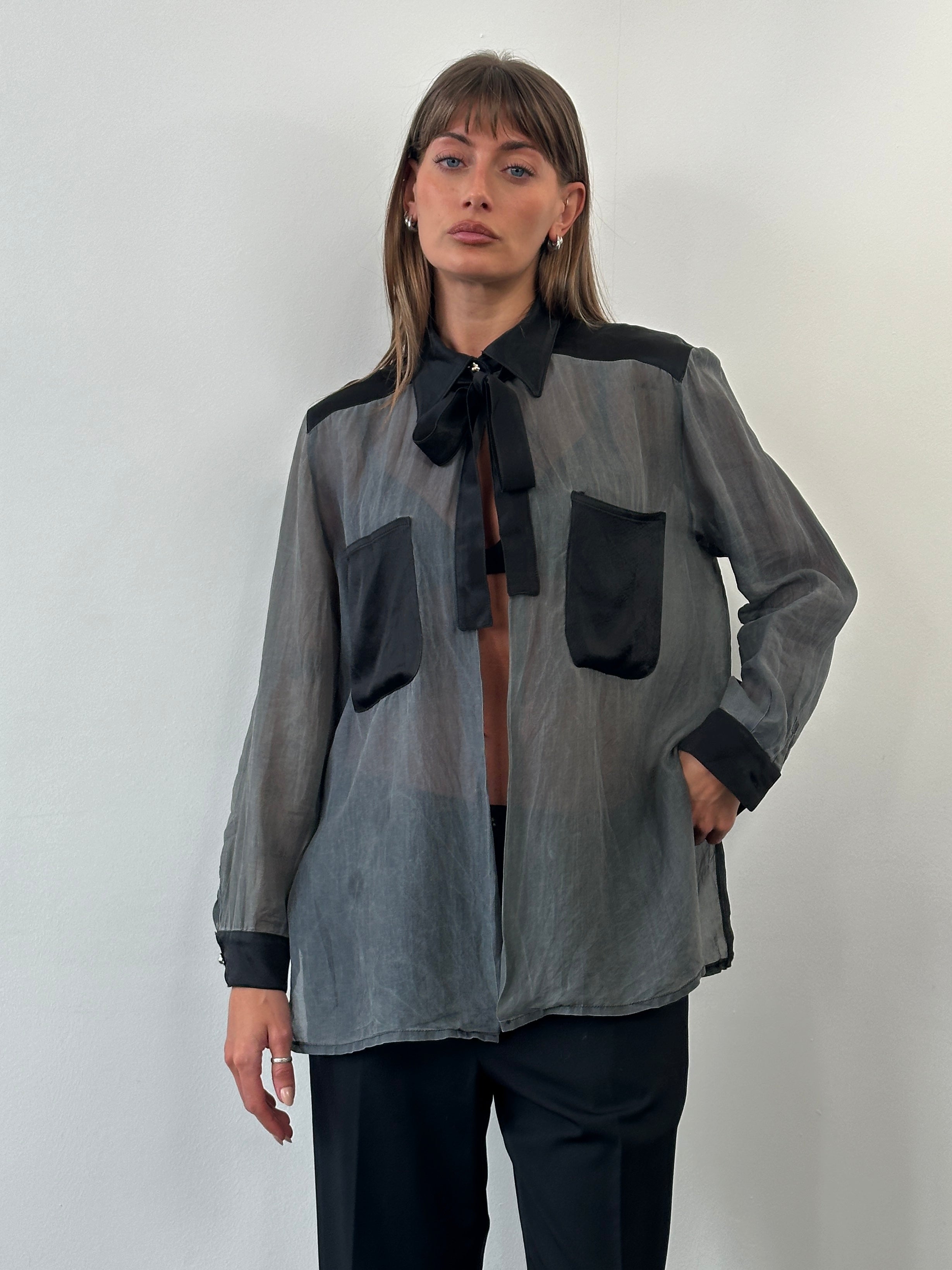 Vintage 1990s sheer satin tie-neck shirt in size M, lightweight and stylish with classic 90s fashion details.