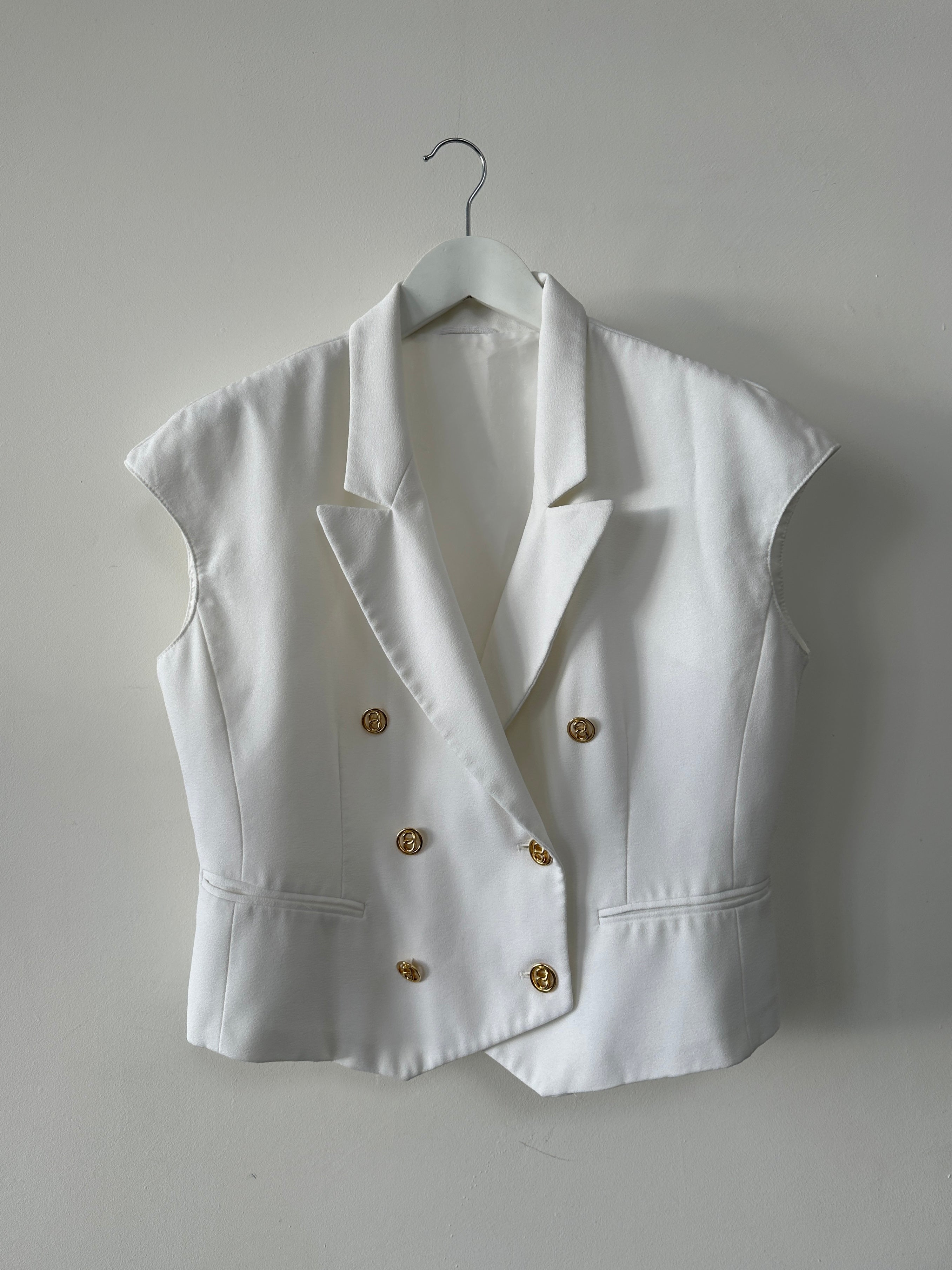 St Michael circa 90s double-breasted men's waistcoat in size M/L, classic vintage style with button details.