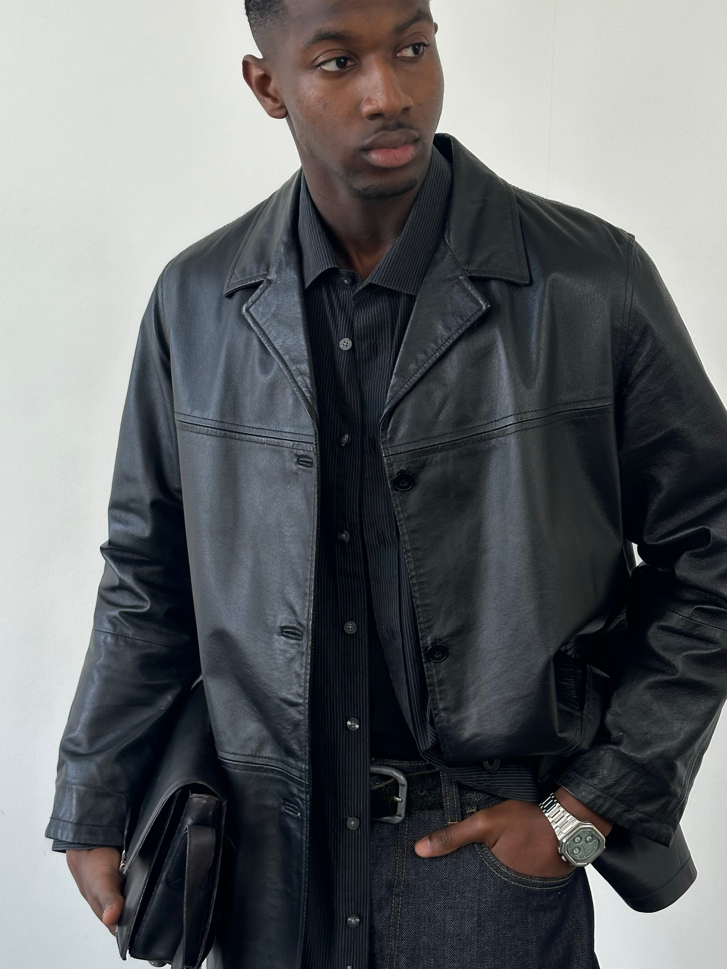 Vintage Italian 1990s single-breasted leather jacket in size large, classic design with smooth brown leather and structured fit.