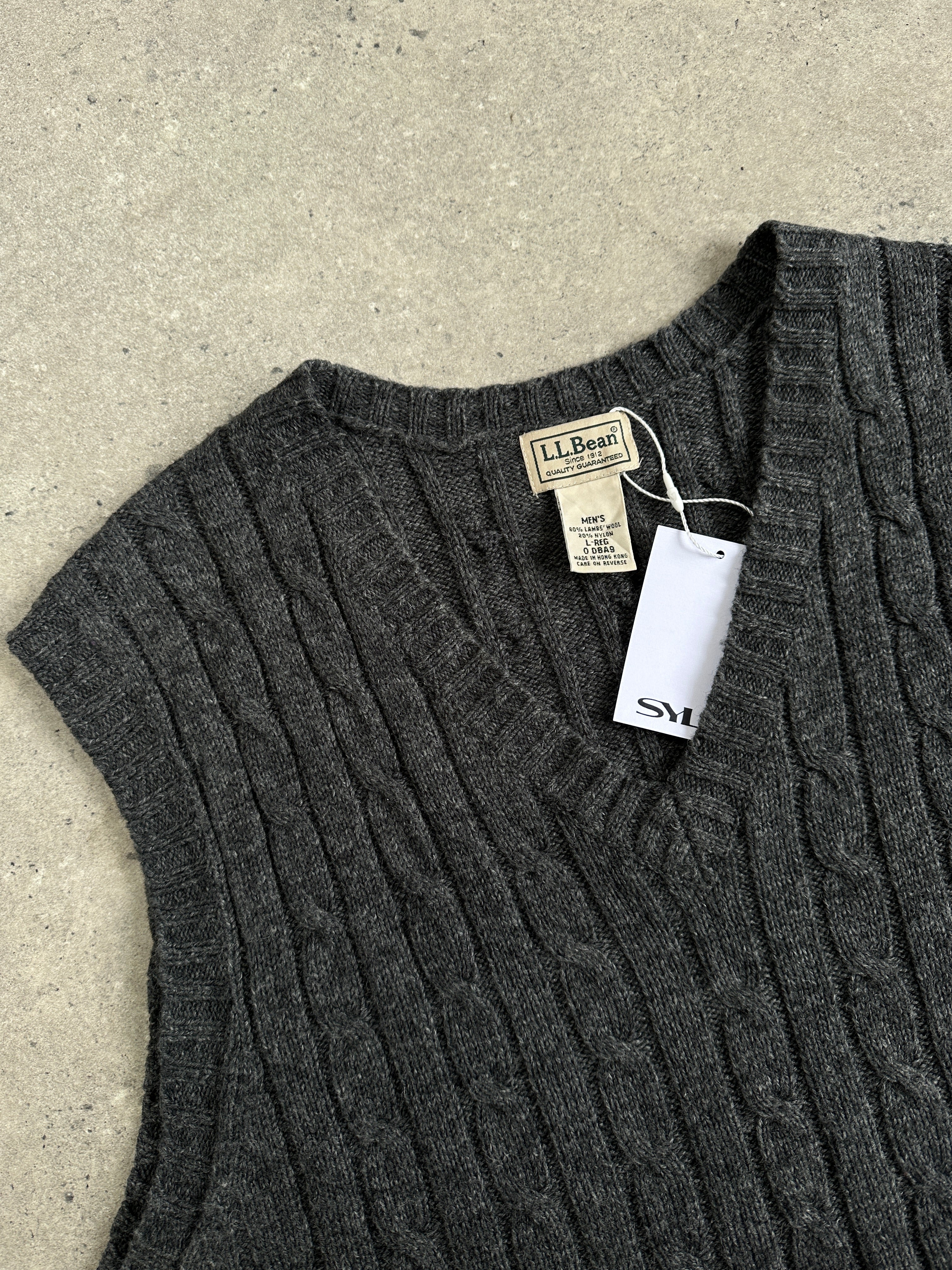 L.L.Bean beige lambswool cable knit sleeveless vest jumper in size L/XL, showing detailed cable pattern and classic design.