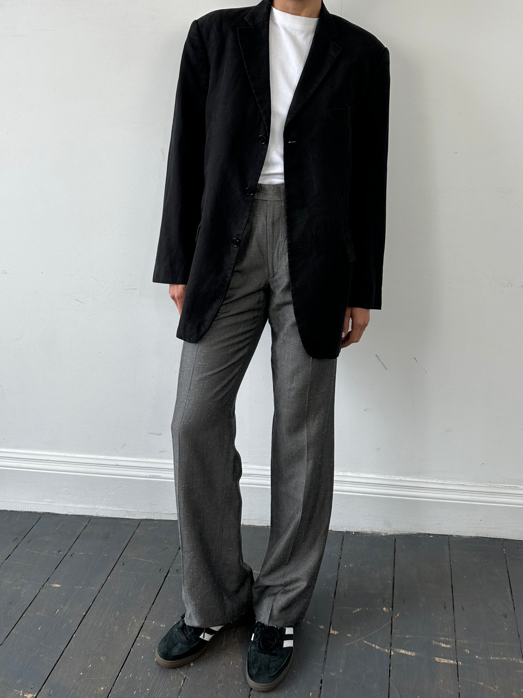Balmain pure linen single-breasted blazer in size 42R/XL, displayed on a hanger with a tailored fit and classic lapel design.